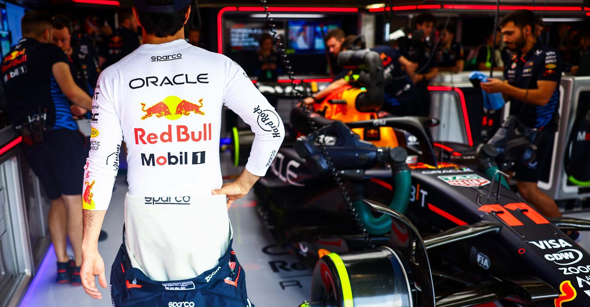 SPA, BELGIUM - JULY 26: Sergio Perez of Mexico and Oracle Red Bull Racing prepares to drive in the garage prior to practice ahead of the F1 Grand Prix of Belgium at Circuit de Spa-Francorchamps on July 26, 2024 in Spa, Belgium. (Photo by Mark Thompson/Getty Images) // Getty Images / Red Bull Content Pool // SI202407260657 // Usage for editorial use only //