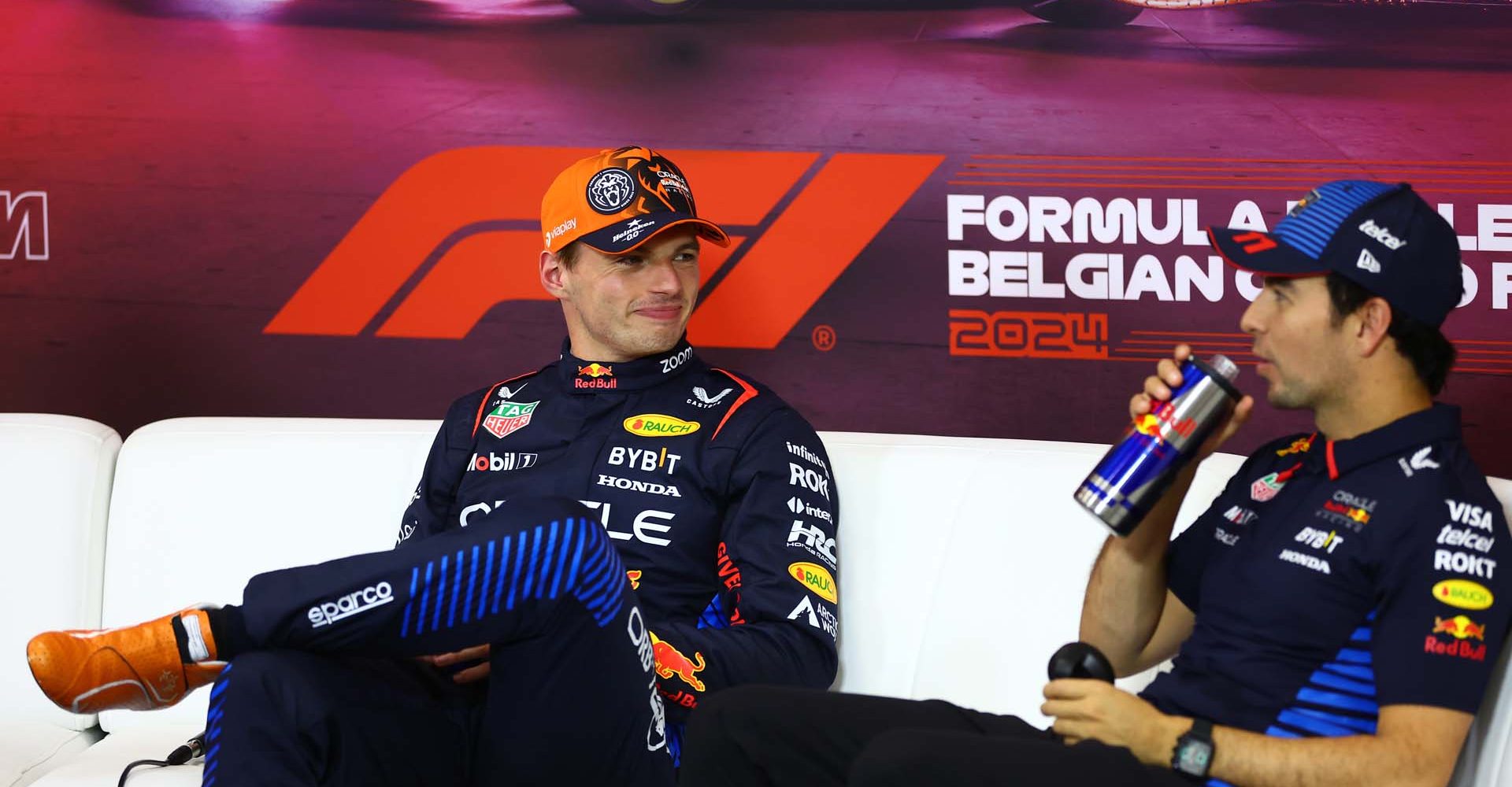 SPA, BELGIUM - JULY 27: Pole position qualifier Max Verstappen of the Netherlands and Oracle Red Bull Racing and Third placed Sergio Perez of Mexico and Oracle Red Bull Racing attend the press conference after qualifying ahead of the F1 Grand Prix of Belgium at Circuit de Spa-Francorchamps on July 27, 2024 in Spa, Belgium. (Photo by Bryn Lennon/Getty Images) // Getty Images / Red Bull Content Pool // SI202407270392 // Usage for editorial use only //