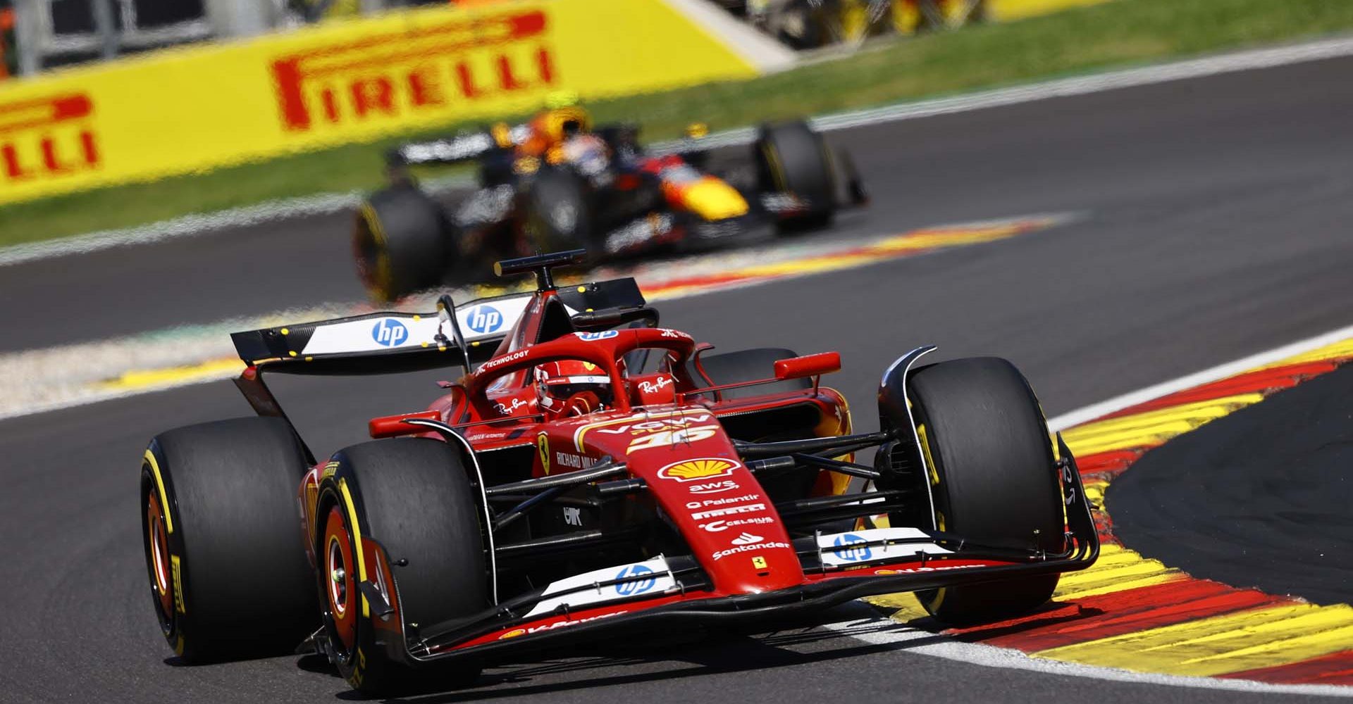 CIRCUIT DE SPA FRANCORCHAMPS, BELGIUM - JULY 28: Charles Leclerc, Ferrari SF-24, leads Sergio Perez, Red Bull Racing RB20 during the Belgian GP at Circuit de Spa Francorchamps on Sunday July 28, 2024 in Spa, Belgium. (Photo by Andy Hone / LAT Images)