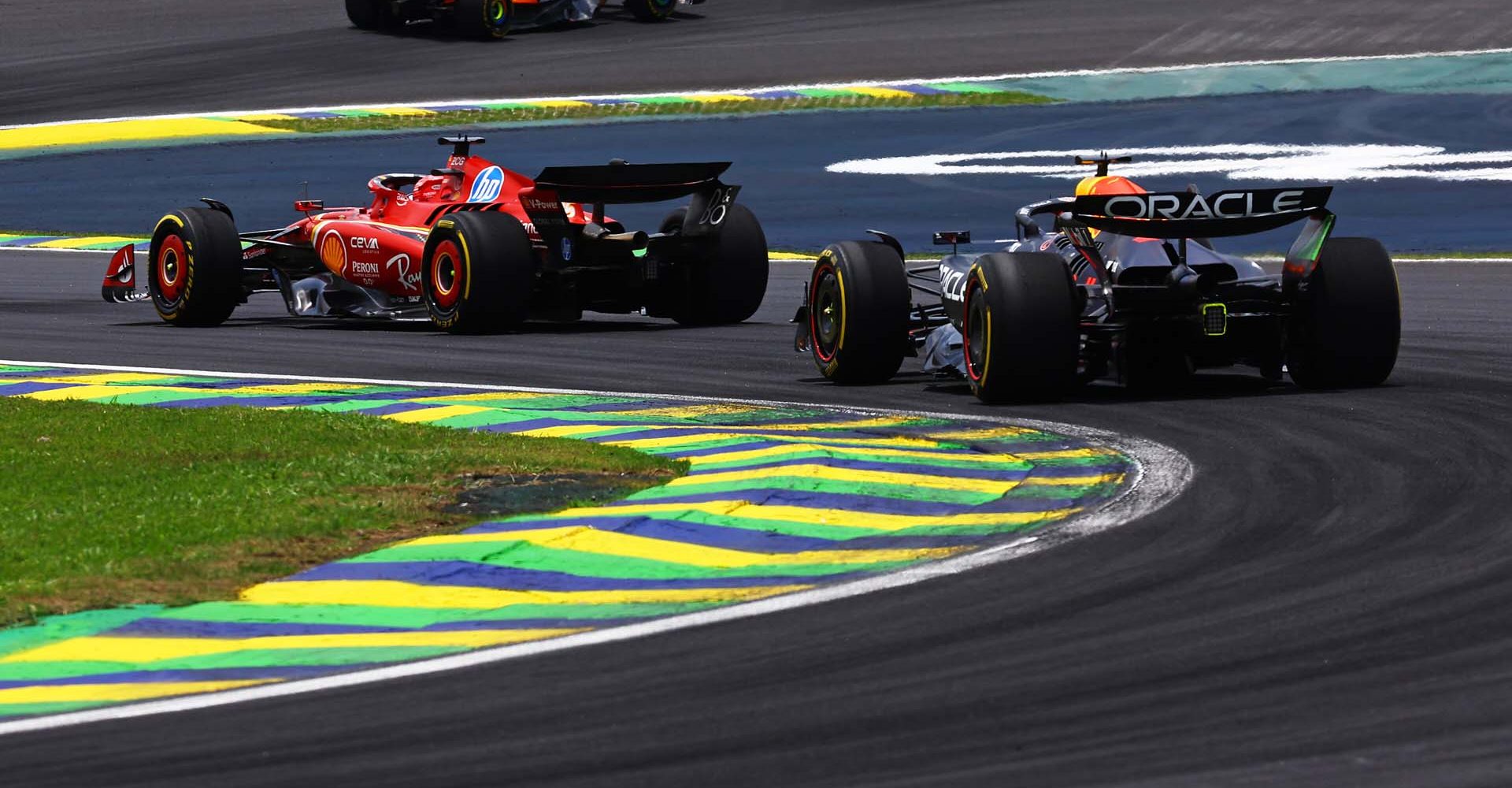 SAO PAULO, BRAZIL - NOVEMBER 02: Max Verstappen of the Netherlands driving the (1) Oracle Red Bull Racing RB20 follows Charles Leclerc of Monaco driving the (16) Ferrari SF-24 during the Sprint ahead of the F1 Grand Prix of Brazil at Autodromo Jose Carlos Pace on November 02, 2024 in Sao Paulo, Brazil. (Photo by Mark Thompson/Getty Images) // Getty Images / Red Bull Content Pool // SI202411020297 // Usage for editorial use only //