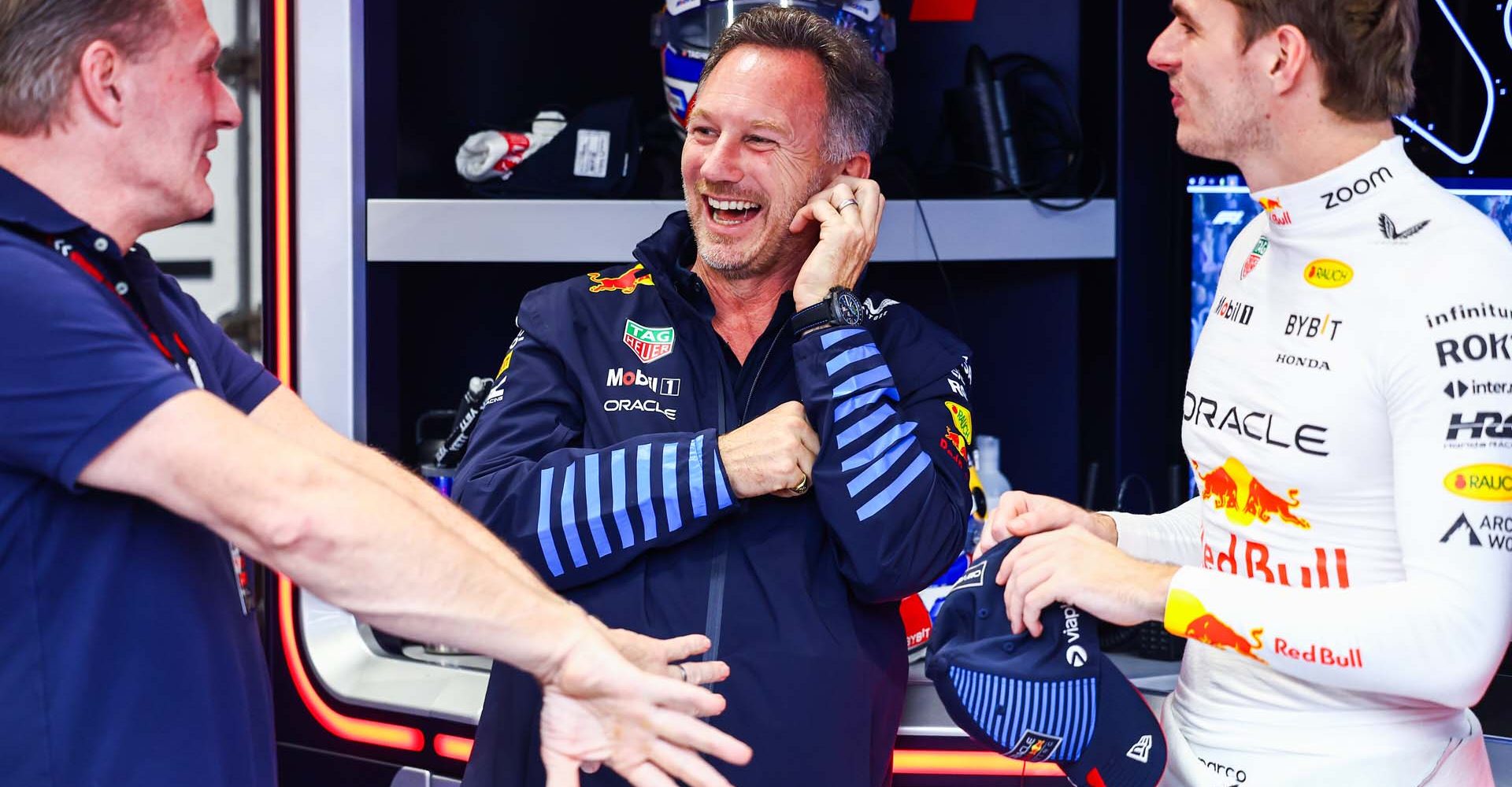 SAO PAULO, BRAZIL - NOVEMBER 02: Oracle Red Bull Racing Team Principal Christian Horner, Max Verstappen of the Netherlands and Oracle Red Bull Racing and Jos Verstappen talk in the garage as they await the start of qualifying ahead of the F1 Grand Prix of Brazil at Autodromo Jose Carlos Pace on November 02, 2024 in Sao Paulo, Brazil. (Photo by Mark Thompson/Getty Images) // Getty Images / Red Bull Content Pool // SI202411020508 // Usage for editorial use only //