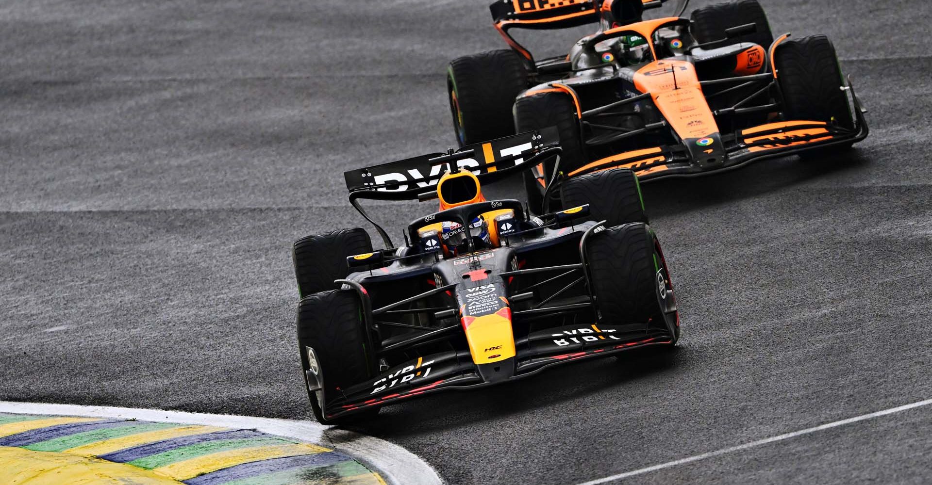 SAO PAULO, BRAZIL - NOVEMBER 03: Max Verstappen of the Netherlands driving the (1) Oracle Red Bull Racing RB20 leads Oscar Piastri of Australia driving the (81) McLaren MCL38 Mercedes on track during the F1 Grand Prix of Brazil at Autodromo Jose Carlos Pace on November 03, 2024 in Sao Paulo, Brazil. (Photo by Rudy Carezzevoli/Getty Images) // Getty Images / Red Bull Content Pool // SI202411030382 // Usage for editorial use only //