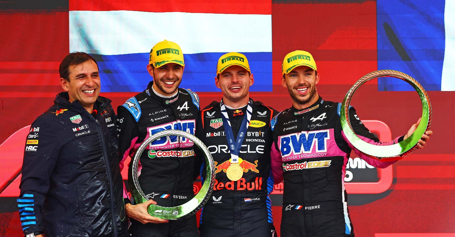 SAO PAULO, BRAZIL - NOVEMBER 03: Race winner Max Verstappen of the Netherlands and Oracle Red Bull Racing, Second placed Esteban Ocon of France and Alpine F1 and Third placed Pierre Gasly of France and Alpine F1 pose for a photo on the podium after the F1 Grand Prix of Brazil at Autodromo Jose Carlos Pace on November 03, 2024 in Sao Paulo, Brazil. (Photo by Mark Thompson/Getty Images) // Getty Images / Red Bull Content Pool // SI202411030606 // Usage for editorial use only //