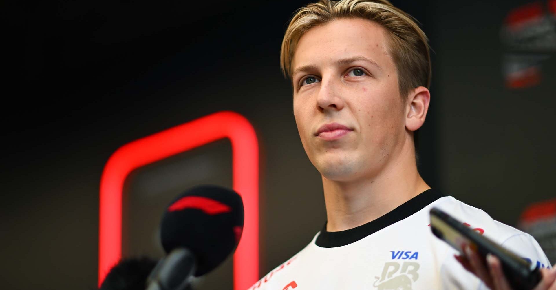 SAO PAULO, BRAZIL - OCTOBER 31: Liam Lawson of New Zealand and Visa Cash App RB talks to the media in the Paddock during previews ahead of the F1 Grand Prix of Brazil at Autodromo Jose Carlos Pace on October 31, 2024 in Sao Paulo, Brazil. (Photo by Rudy Carezzevoli/Getty Images) // Getty Images / Red Bull Content Pool // SI202410310276 // Usage for editorial use only //