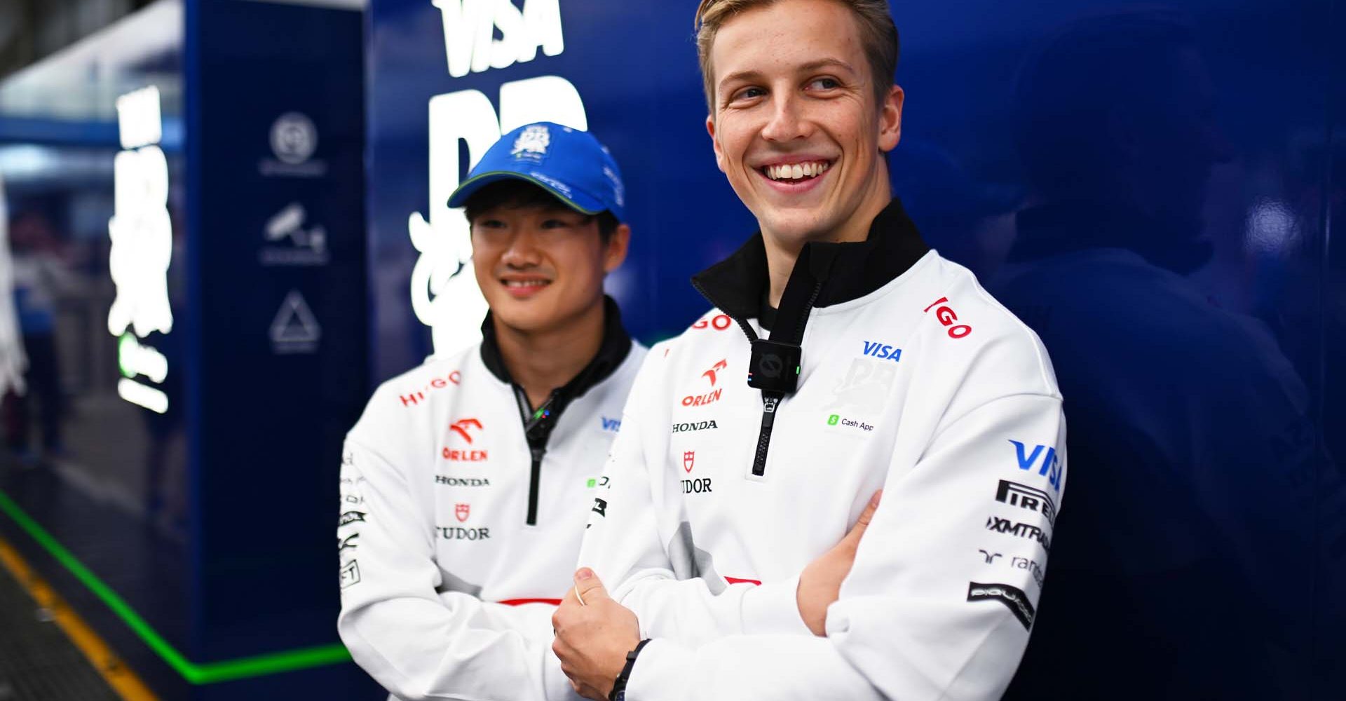 SAO PAULO, BRAZIL - OCTOBER 31: Liam Lawson of New Zealand and Visa Cash App RB and Yuki Tsunoda of Japan and Visa Cash App RB look on in the Paddock during previews ahead of the F1 Grand Prix of Brazil at Autodromo Jose Carlos Pace on October 31, 2024 in Sao Paulo, Brazil. (Photo by Rudy Carezzevoli/Getty Images) // Getty Images / Red Bull Content Pool // SI202410310551 // Usage for editorial use only //