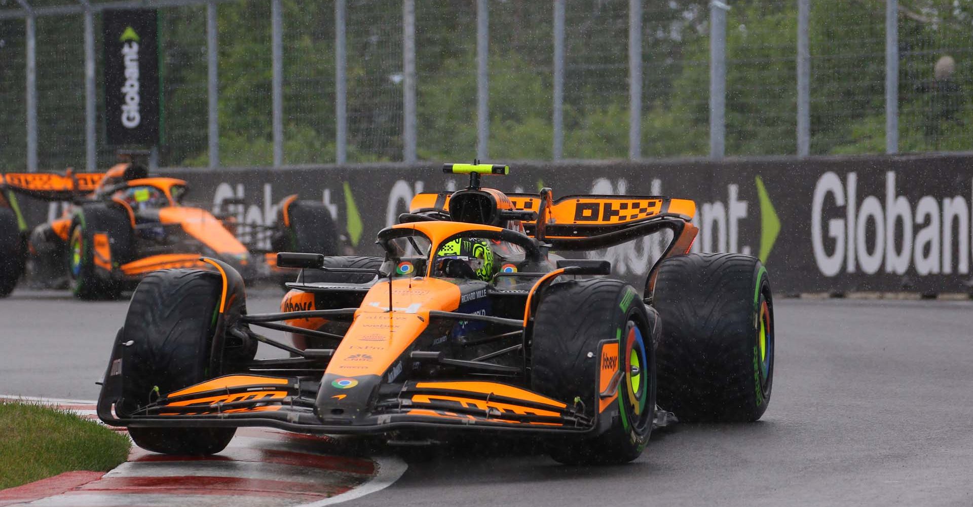 Lando Norris, McLaren MCL38, leads Oscar Piastri, McLaren MCL38