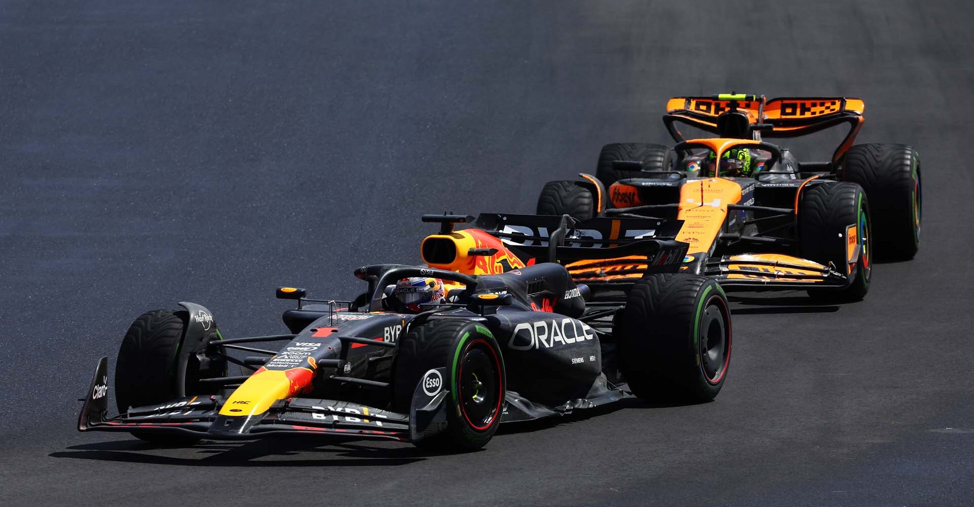 MONTREAL, QUEBEC - JUNE 09: Max Verstappen of the Netherlands driving the (1) Oracle Red Bull Racing RB20 leads Lando Norris of Great Britain driving the (4) McLaren MCL38 Mercedes during the F1 Grand Prix of Canada at Circuit Gilles Villeneuve on June 09, 2024 in Montreal, Quebec. (Photo by Clive Rose/Getty Images) // Getty Images / Red Bull Content Pool // SI202406090572 // Usage for editorial use only //