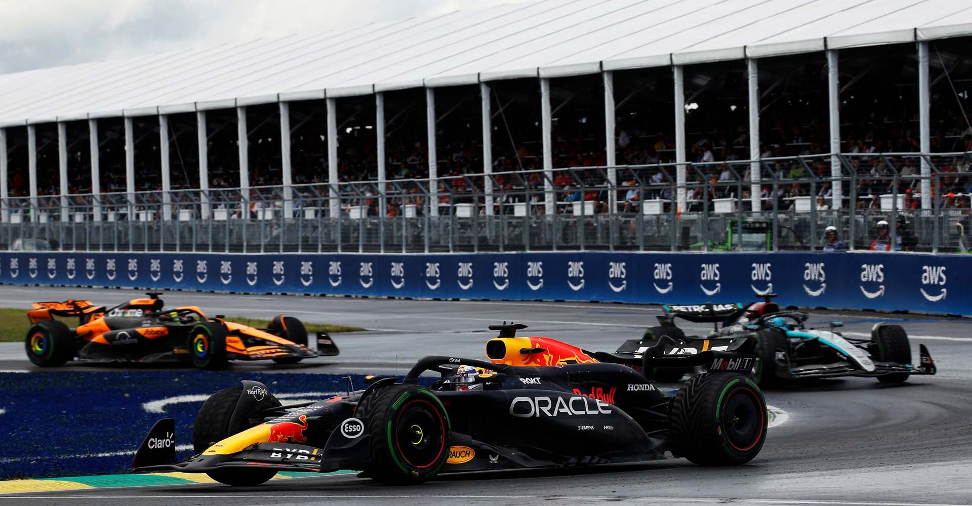 MONTREAL, QUEBEC - JUNE 09: Max Verstappen of the Netherlands driving the (1) Oracle Red Bull Racing RB20 leads George Russell of Great Britain driving the (63) Mercedes AMG Petronas F1 Team W15 on track during the F1 Grand Prix of Canada at Circuit Gilles Villeneuve on June 09, 2024 in Montreal, Quebec. (Photo by Chris Graythen/Getty Images) // Getty Images / Red Bull Content Pool // SI202406090588 // Usage for editorial use only //