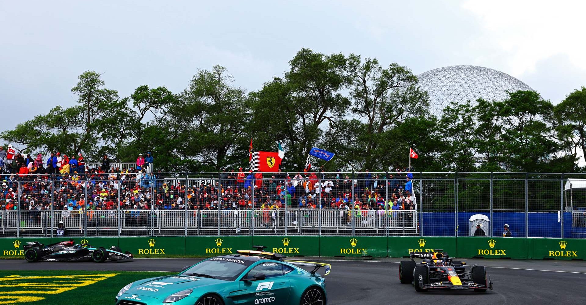 MONTREAL, QUEBEC - JUNE 09: The The FIA Safety Car leads Max Verstappen of the Netherlands driving the (1) Oracle Red Bull Racing RB20 on track during the F1 Grand Prix of Canada at Circuit Gilles Villeneuve on June 09, 2024 in Montreal, Quebec. (Photo by Clive Rose/Getty Images) // Getty Images / Red Bull Content Pool // SI202406090597 // Usage for editorial use only //