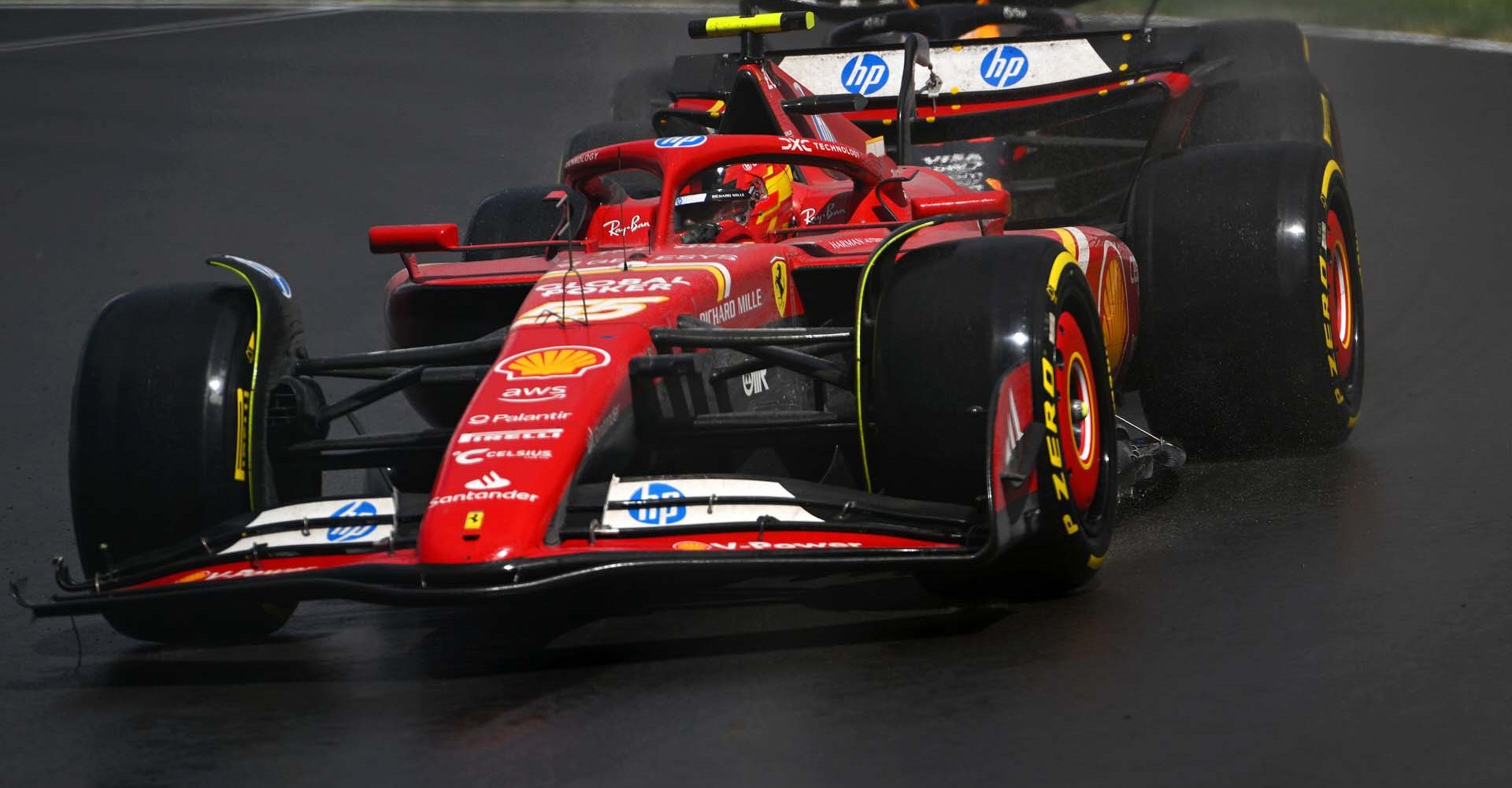 MONTREAL, QUEBEC - JUNE 09: Carlos Sainz of Spain driving (55) the Ferrari SF-24 leads Sergio Perez of Mexico driving the (11) Oracle Red Bull Racing RB20 on track during the F1 Grand Prix of Canada at Circuit Gilles Villeneuve on June 09, 2024 in Montreal, Quebec. (Photo by Rudy Carezzevoli/Getty Images) // Getty Images / Red Bull Content Pool // SI202406090978 // Usage for editorial use only //