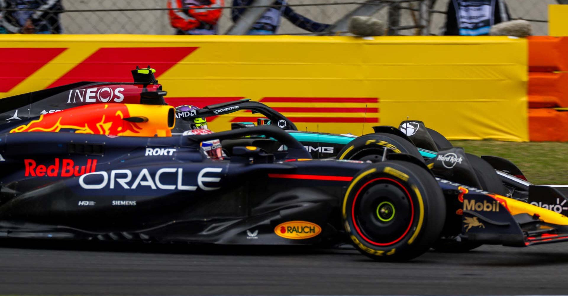 SHANGHAI, CHINA - APRIL 20: Max Verstappen of Oracle Red Bull Racing and The Netherlands overtakes Lewis Hamilton of Mercedes and Great Britain during the Sprint ahead of the F1 Grand Prix of China at Shanghai International Circuit on April 20, 2024 in Shanghai, China. (Photo by Peter Fox/Getty Images) // Getty Images / Red Bull Content Pool // SI202404200216 // Usage for editorial use only //