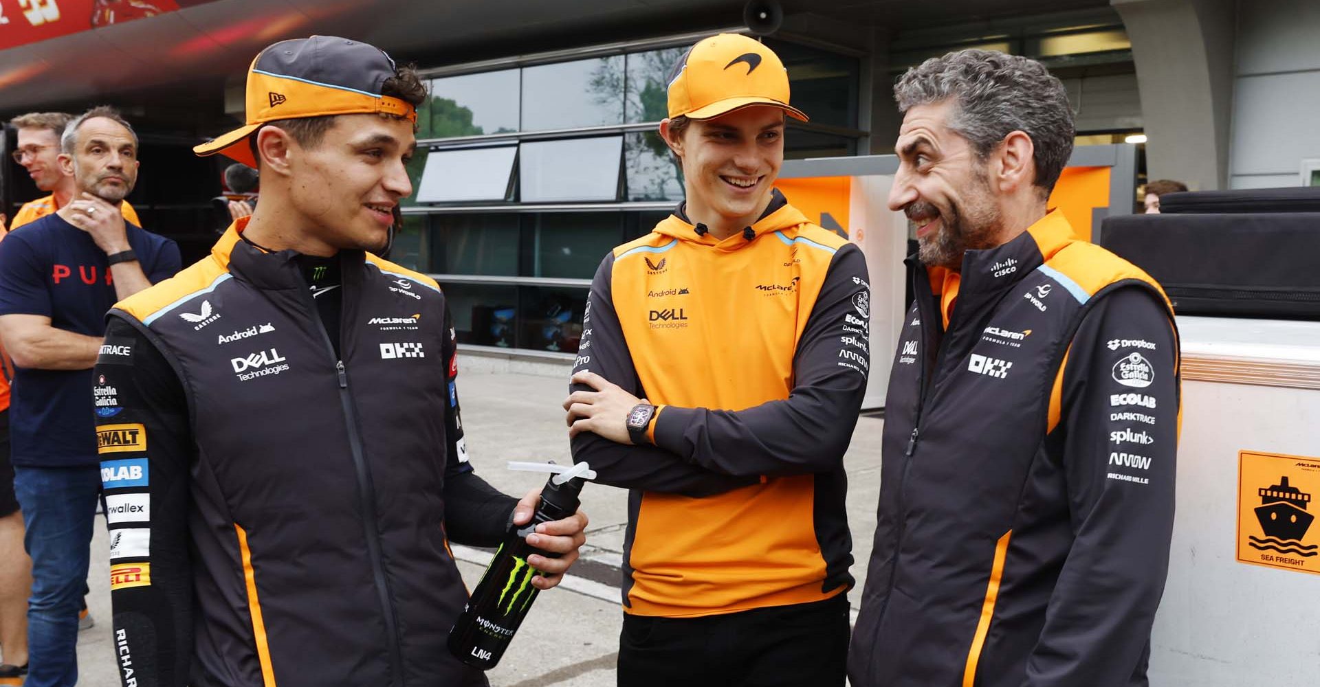 Lando Norris, McLaren F1 Team, 2nd position, holding his trophy, with Oscar Piastri, McLaren F1 Team, and Andrea Stella, Team Principal, McLaren F1 Team