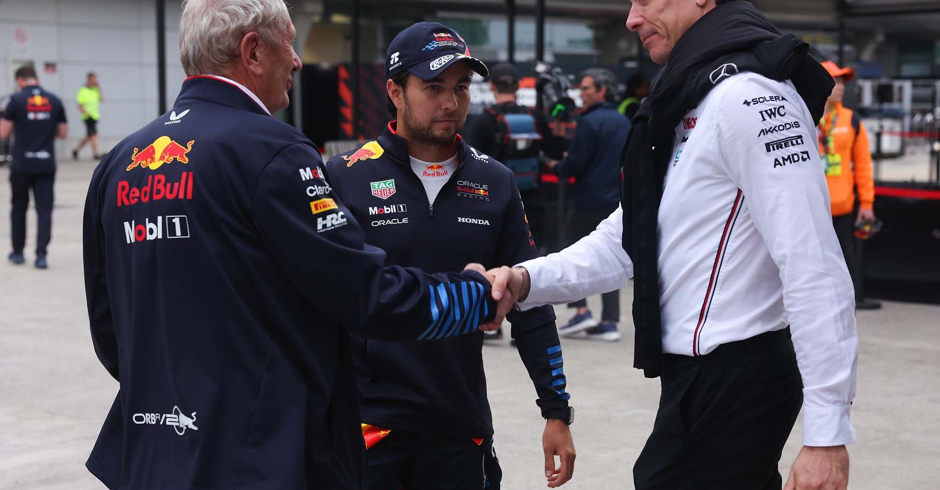 SHANGHAI, CHINA - APRIL 21: Mercedes GP Executive Director Toto Wolff, Helmut Marko and Third placed Sergio Perez of Mexico and Oracle Red Bull Racing talk in the pa during the F1 Grand Prix of China at Shanghai International Circuit on April 21, 2024 in Shanghai, China. (Photo by Lars Baron/Getty Images) // Getty Images / Red Bull Content Pool // SI202404210470 // Usage for editorial use only //