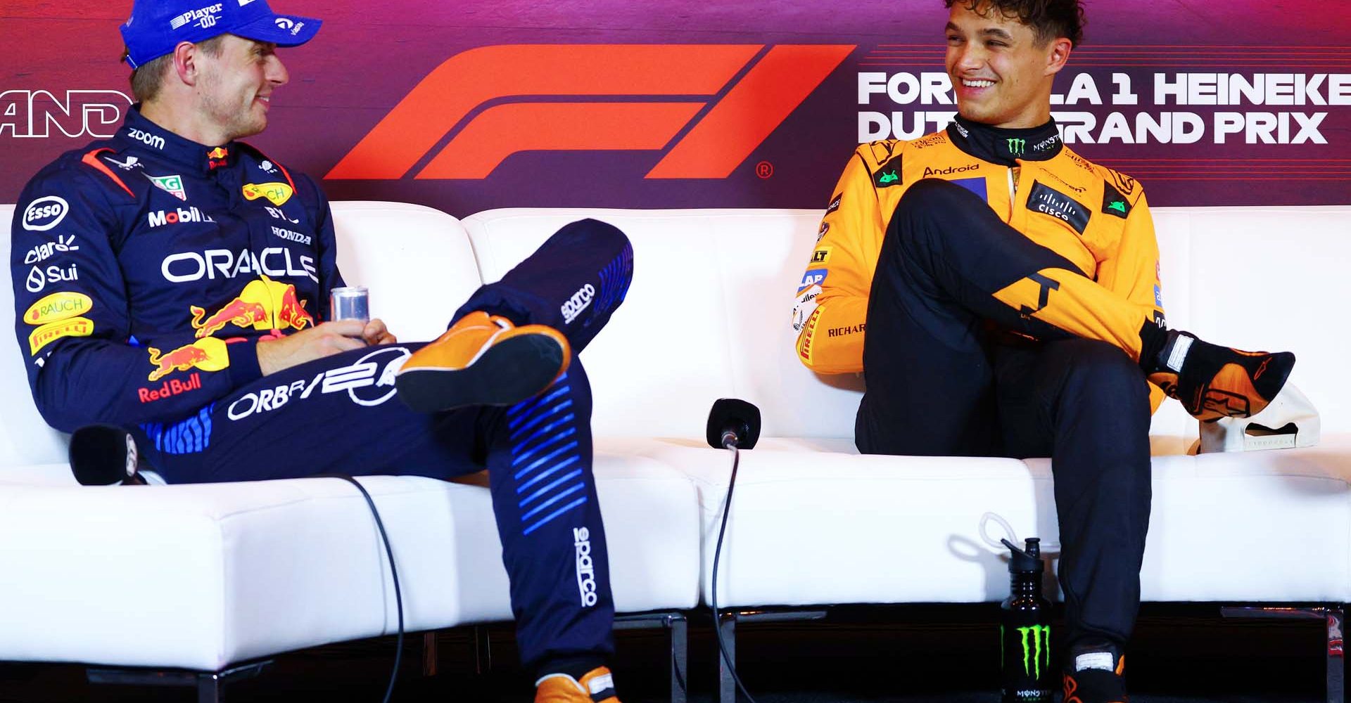 ZANDVOORT, NETHERLANDS - AUGUST 24: Second placed qualifier Max Verstappen of the Netherlands and Oracle Red Bull Racing and pole position qualifier Lando Norris of Great Britain and McLaren attend the press conference after qualifying ahead of the F1 Grand Prix of Netherlands at Circuit Zandvoort on August 24, 2024 in Zandvoort, Netherlands. (Photo by Clive Rose/Getty Images) // Getty Images / Red Bull Content Pool // SI202408240282 // Usage for editorial use only //