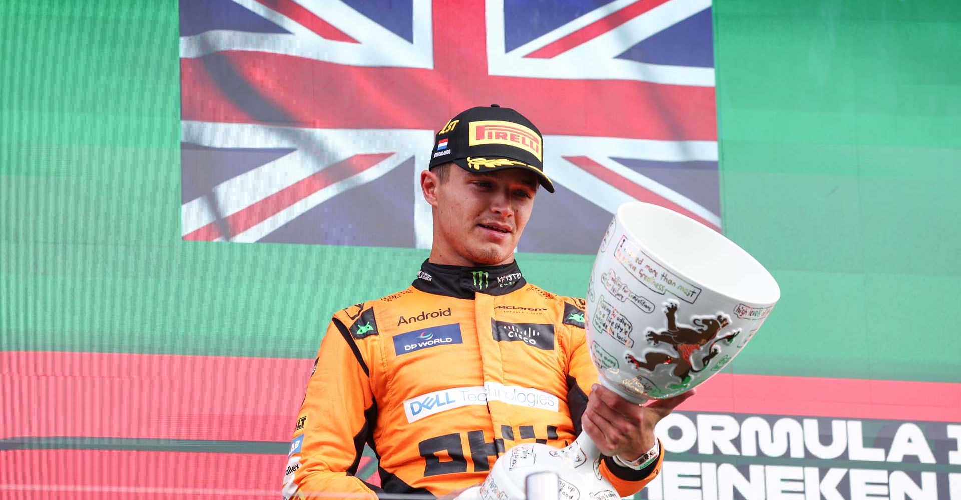 CIRCUIT ZANDVOORT, NETHERLANDS - AUGUST 25: Lando Norris, McLaren F1 Team, 1st position, inspects his trophy on the podium during the Dutch GP at Circuit Zandvoort on Sunday August 25, 2024 in North Holland, Netherlands. (Photo by Alastair Staley / LAT Images)