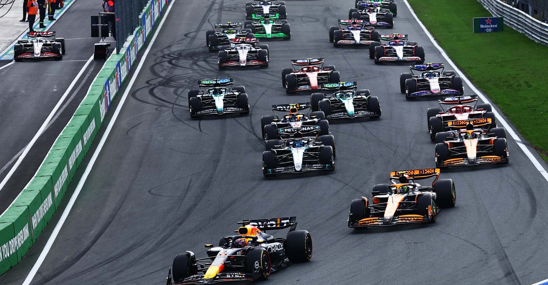 ZANDVOORT, NETHERLANDS - AUGUST 25: Max Verstappen of the Netherlands driving the (1) Oracle Red Bull Racing RB20 leads Lando Norris of Great Britain driving the (4) McLaren MCL38 Mercedes during the F1 Grand Prix of Netherlands at Circuit Zandvoort on August 25, 2024 in Zandvoort, Netherlands. (Photo by Mark Thompson/Getty Images) // Getty Images / Red Bull Content Pool // SI202408250216 // Usage for editorial use only //