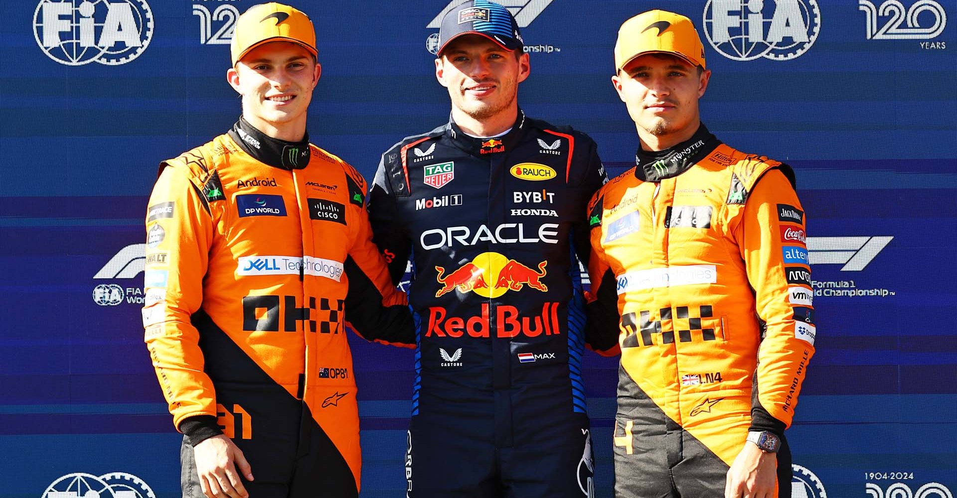 IMOLA, ITALY - MAY 18: Pole position qualifier Max Verstappen of the Netherlands and Oracle Red Bull Racing, Second placed qualifier Oscar Piastri of Australia and McLaren and Third placed qualifier Lando Norris of Great Britain and McLaren pose for a photo in parc ferme during qualifying ahead of the F1 Grand Prix of Emilia-Romagna at Autodromo Enzo e Dino Ferrari Circuit on May 18, 2024 in Imola, Italy. (Photo by Mark Thompson/Getty Images) // Getty Images / Red Bull Content Pool // SI202405180421 // Usage for editorial use only //