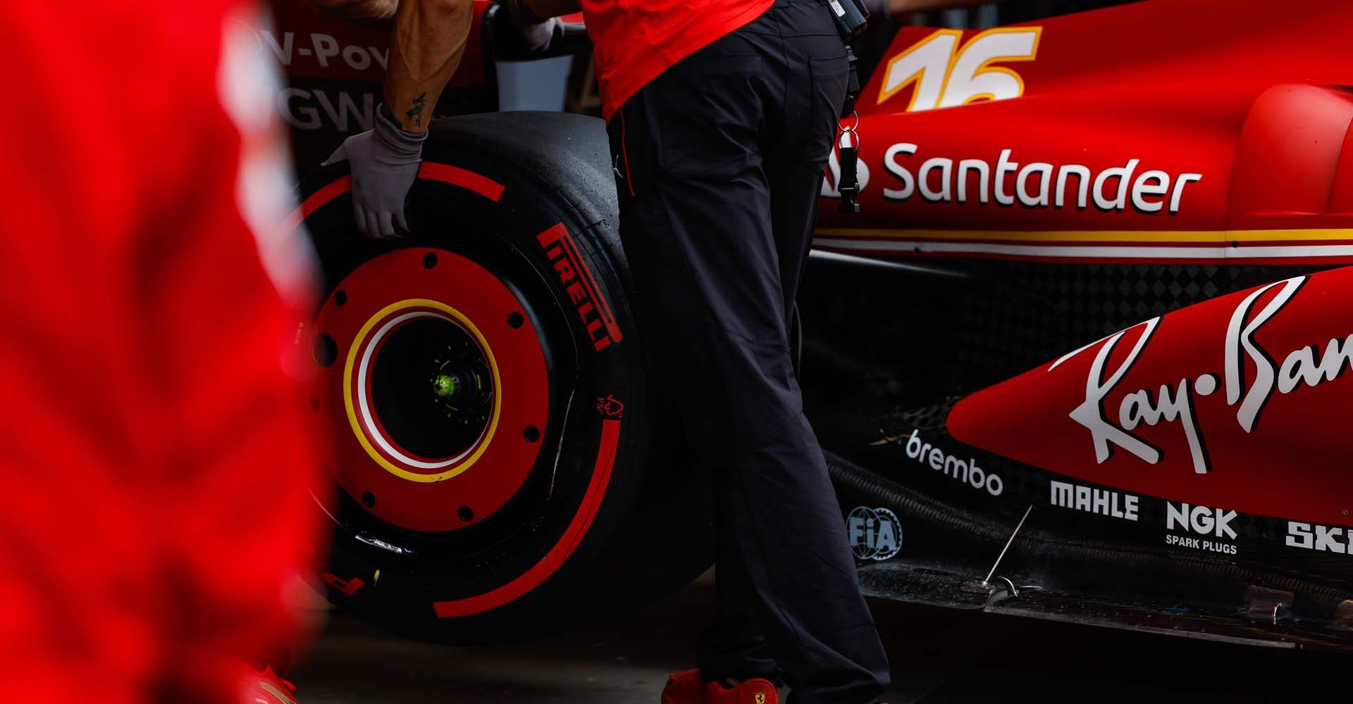 HUNGARORING, HUNGARY - JULY 20: Mechanics in the pit lane with Charles Leclerc, Ferrari SF-24 during the Hungarian GP at Hungaroring on Saturday July 20, 2024 in Budapest, Hungary. (Photo by Glenn Dunbar / LAT Images)