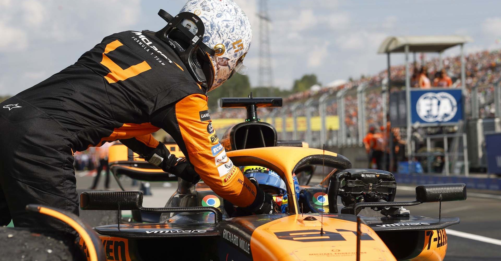 Lando Norris, McLaren F1 Team, 2nd position, congratulates Oscar Piastri, McLaren F1 Team, 1st position, on arrival in Parc Ferme