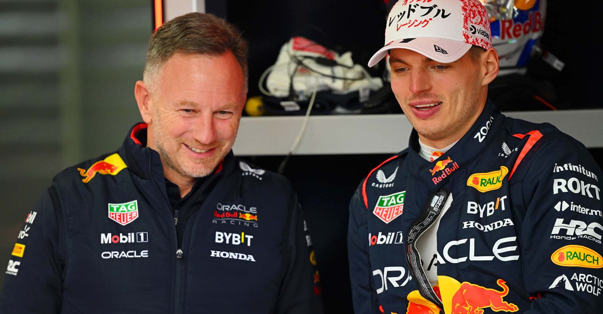 SUZUKA, JAPAN - APRIL 05: Oracle Red Bull Racing Team Principal Christian Horner and Max Verstappen of the Netherlands and Oracle Red Bull Racing talk in the garage during practice ahead of the F1 Grand Prix of Japan at Suzuka International Racing Course on April 05, 2024 in Suzuka, Japan. (Photo by Clive Mason/Getty Images) // Getty Images / Red Bull Content Pool // SI202404050538 // Usage for editorial use only //