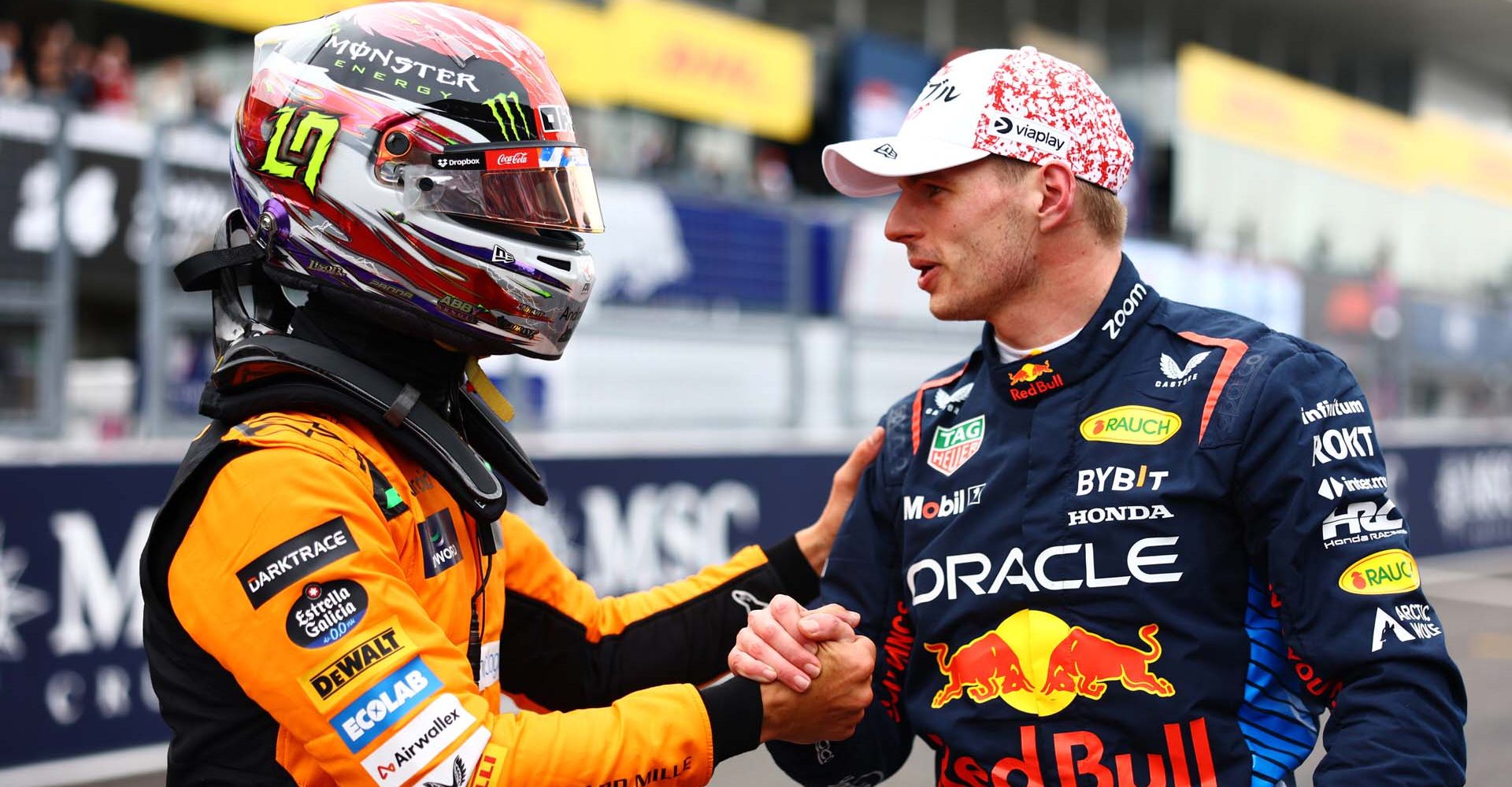 SUZUKA, JAPAN - APRIL 06: Pole position qualifier Max Verstappen of the Netherlands and Oracle Red Bull Racing and Third placed qualifier Lando Norris of Great Britain and McLaren talk in parc ferme during qualifying ahead of the F1 Grand Prix of Japan at Suzuka International Racing Course on April 06, 2024 in Suzuka, Japan. (Photo by Mark Thompson/Getty Images) // Getty Images / Red Bull Content Pool // SI202404060279 // Usage for editorial use only //