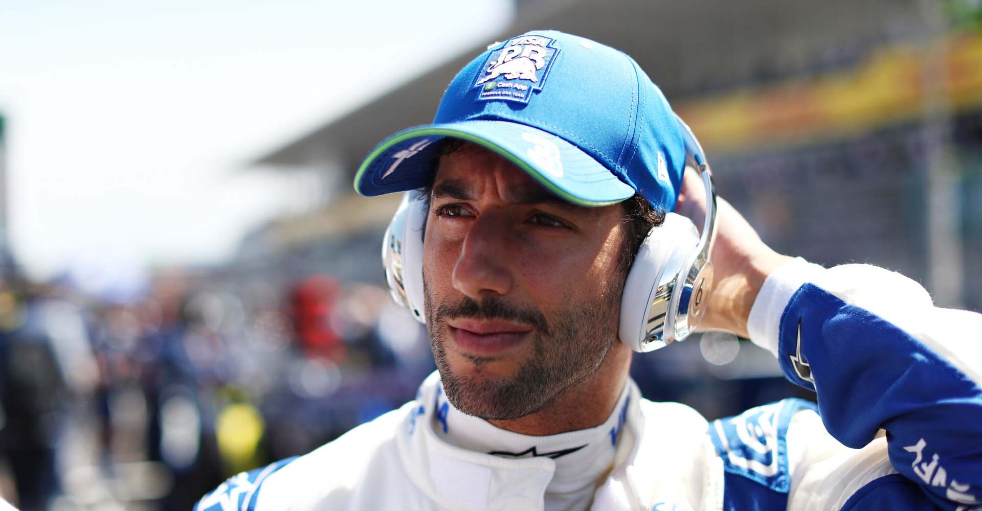 SUZUKA, JAPAN - APRIL 07: Daniel Ricciardo of Australia and Visa Cash App RB prepares to drive on the grid prior to the F1 Grand Prix of Japan at Suzuka International Racing Course on April 07, 2024 in Suzuka, Japan. (Photo by Peter Fox/Getty Images) // Getty Images / Red Bull Content Pool // SI202404070199 // Usage for editorial use only //