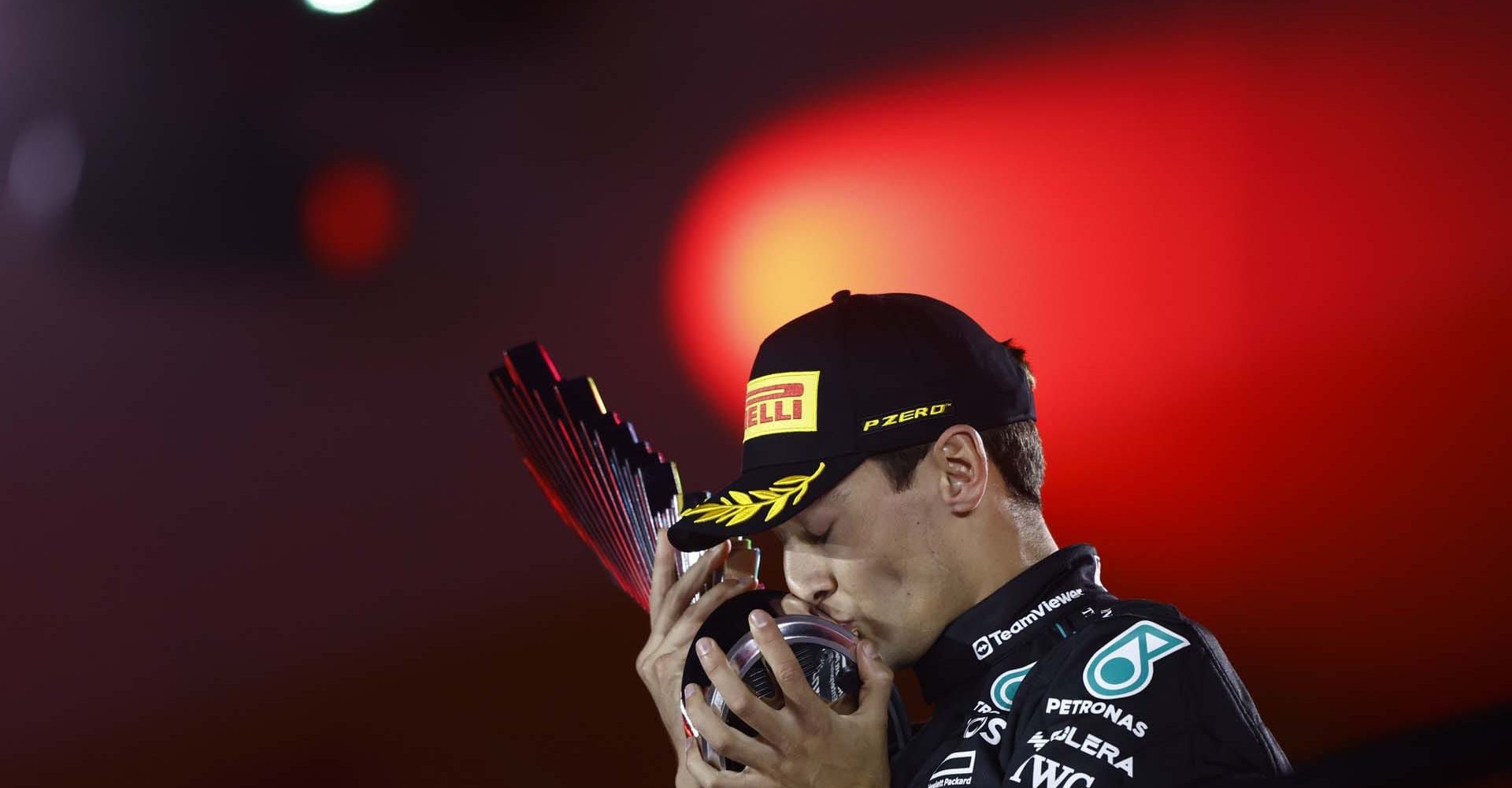 STREETS OF LAS VEGAS, UNITED STATES OF AMERICA - NOVEMBER 23: George Russell, Mercedes-AMG F1 Team, 1st position, on the podium with his trophy during the Las Vegas GP at Streets of Las Vegas on Saturday November 23, 2024, United States of America. (Photo by Zak Mauger / LAT Images)