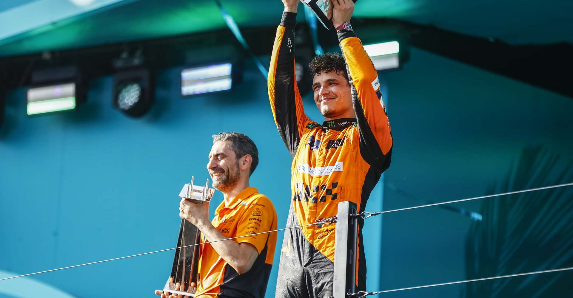 Andrea Stella, Team Principal, McLaren F1 Team, nd Lando Norris, McLaren F1 Team, 1st position, on the podium with the trophies