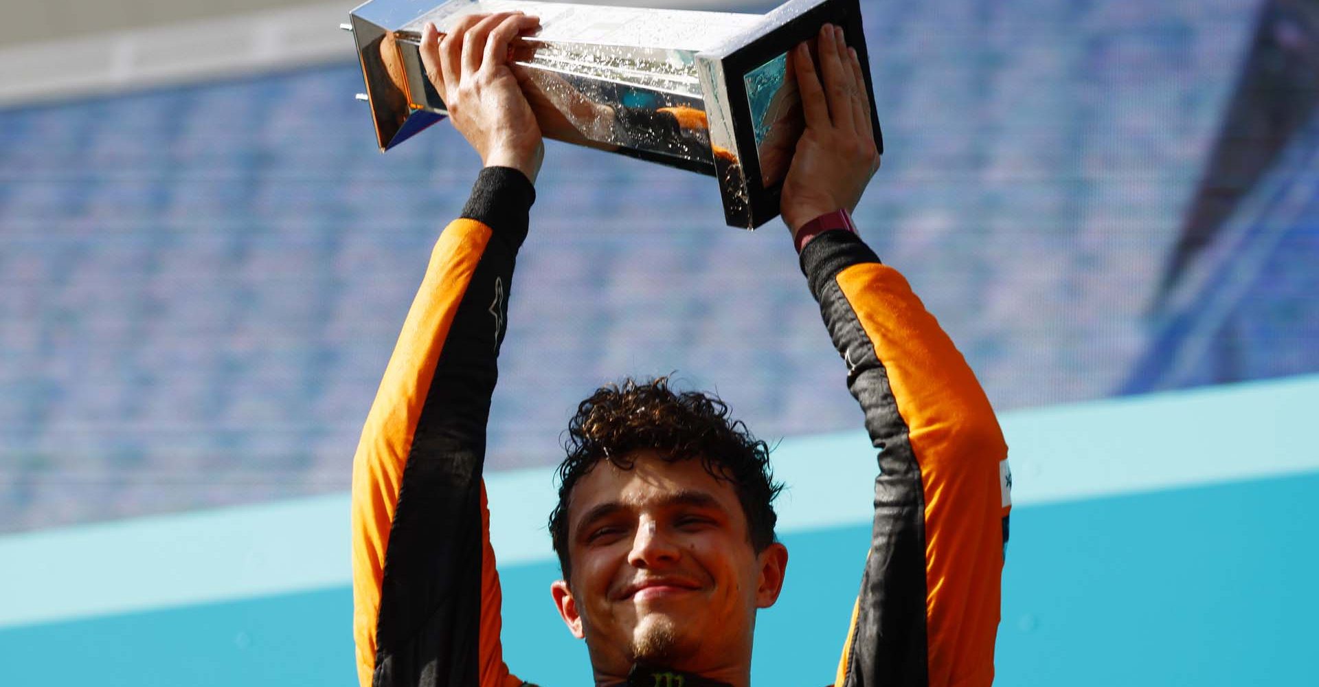 Lando Norris, McLaren F1 Team, 1st position, lifts the winners trophy