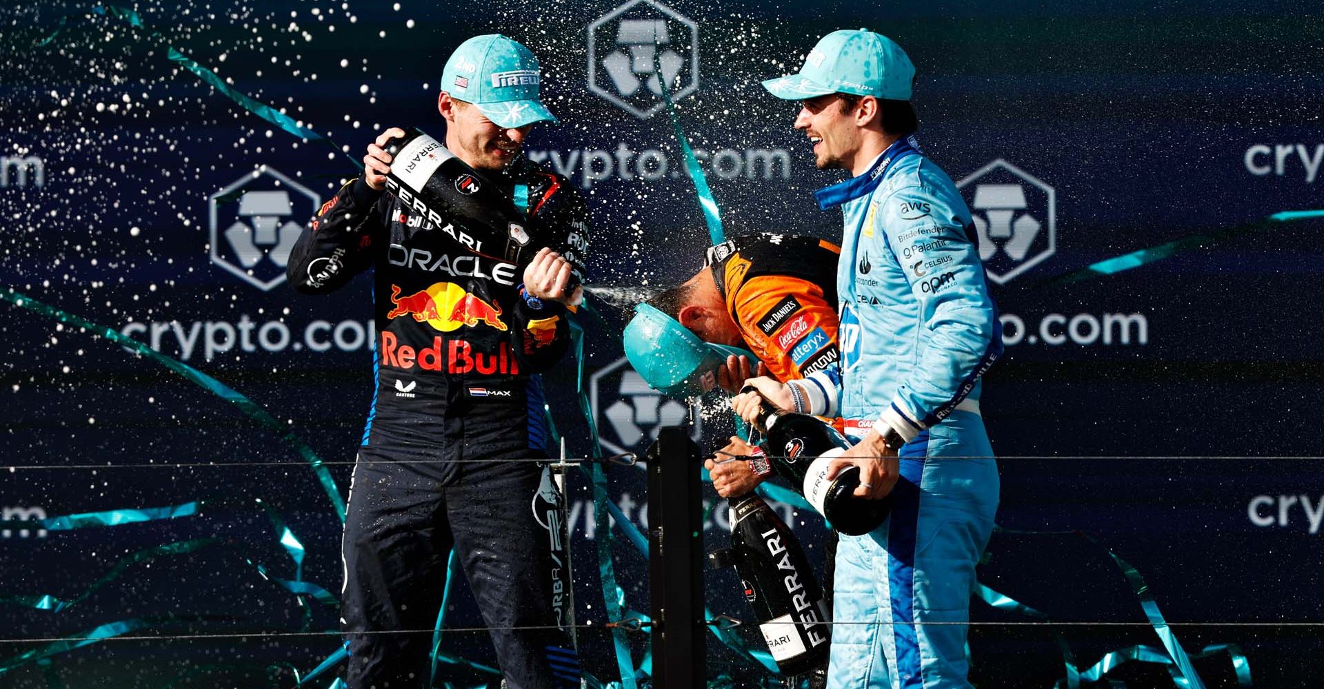 MIAMI, FLORIDA - MAY 05: Race winner Lando Norris of Great Britain and McLaren, Second placed Max Verstappen of the Netherlands and Oracle Red Bull Racing and Third placed Charles Leclerc of Monaco and Ferrari celebrate on the podium after the F1 Grand Prix of Miami at Miami International Autodrome on May 05, 2024 in Miami, Florida. (Photo by Chris Graythen/Getty Images) // Getty Images / Red Bull Content Pool // SI202405060034 // Usage for editorial use only //