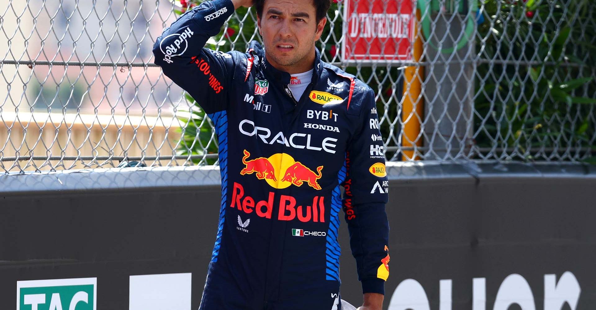 MONTE-CARLO, MONACO - MAY 26: Sergio Perez of Mexico and Oracle Red Bull Racing looks on after crashing at the start during the F1 Grand Prix of Monaco at Circuit de Monaco on May 26, 2024 in Monte-Carlo, Monaco. (Photo by Clive Rose/Getty Images) // Getty Images / Red Bull Content Pool // SI202405260351 // Usage for editorial use only //