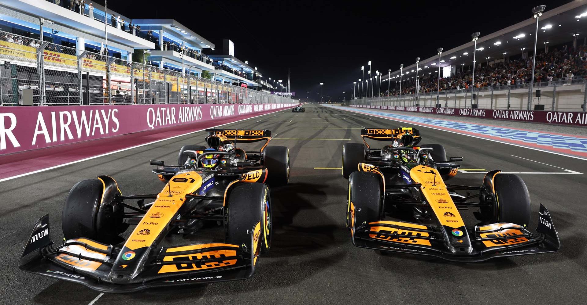 Oscar Piastri, McLaren MCL38, 1st position, and Lando Norris, McLaren MCL38, 2nd position, in Parc Ferme