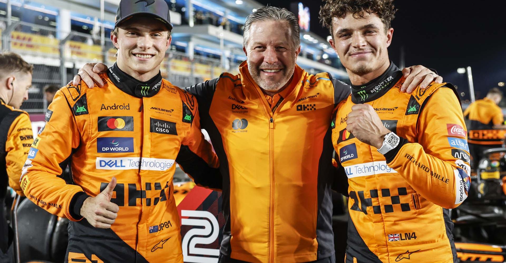 Oscar Piastri, McLaren F1 Team, 1st position, Zak Brown, CEO, McLaren Racing, and Lando Norris, McLaren F1 Team, 2nd position, celebrate after the Sprint race