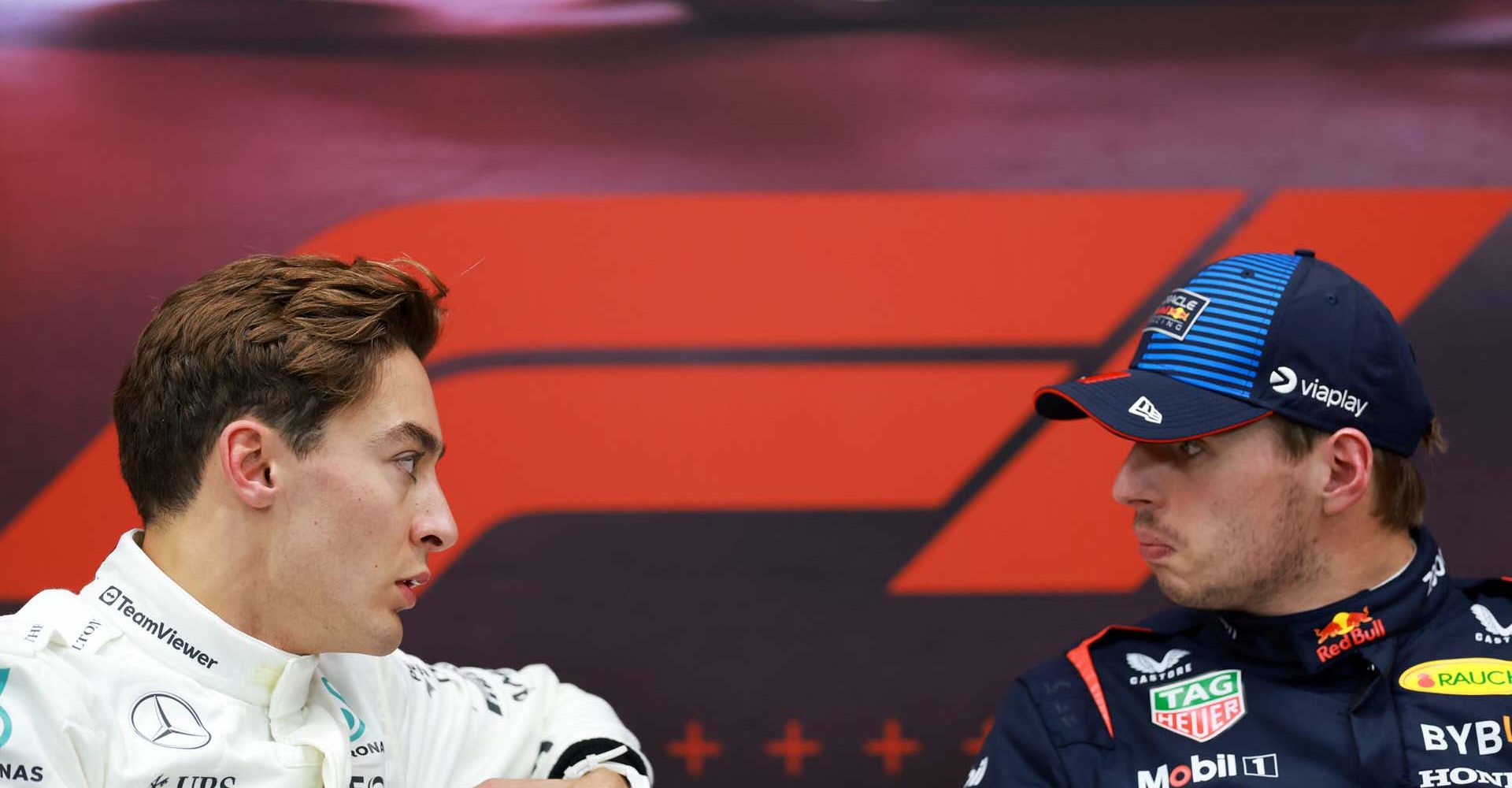 LUSAIL CITY, QATAR - NOVEMBER 30: Pole position qualifier Max Verstappen of the Netherlands and Oracle Red Bull Racing and Second placed qualifier George Russell of Great Britain and Mercedes attend the press conference after qualifying ahead of the F1 Grand Prix of Qatar at Lusail International Circuit on November 30, 2024 in Lusail City, Qatar. (Photo by Bryn Lennon/Getty Images) // Getty Images / Red Bull Content Pool // SI202411300418 // Usage for editorial use only //