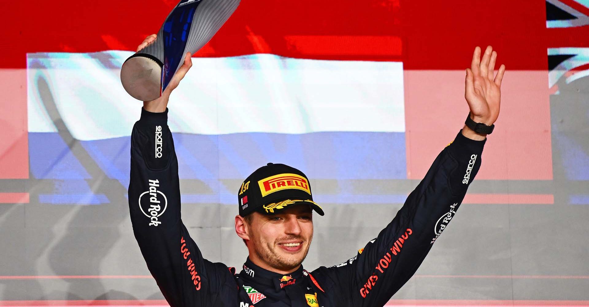 LUSAIL CITY, QATAR - DECEMBER 01: Race winner Max Verstappen of the Netherlands and Oracle Red Bull Racing celebrates on the podium during the F1 Grand Prix of Qatar at Lusail International Circuit on December 01, 2024 in Lusail City, Qatar. (Photo by Clive Mason/Getty Images) // Getty Images / Red Bull Content Pool // SI202412010274 // Usage for editorial use only //