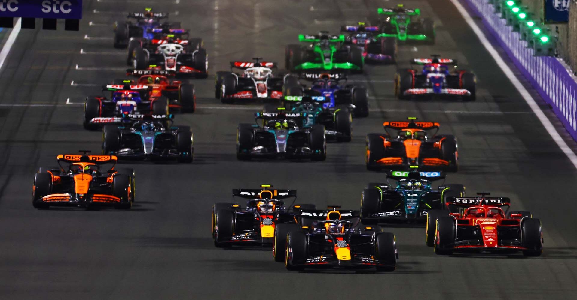 JEDDAH, SAUDI ARABIA - MARCH 09: Max Verstappen of the Netherlands driving the (1) Oracle Red Bull Racing RB20 leads the field at the start during the F1 Grand Prix of Saudi Arabia at Jeddah Corniche Circuit on March 09, 2024 in Jeddah, Saudi Arabia. (Photo by Mark Thompson/Getty Images) // Getty Images / Red Bull Content Pool // SI202403090249 // Usage for editorial use only //