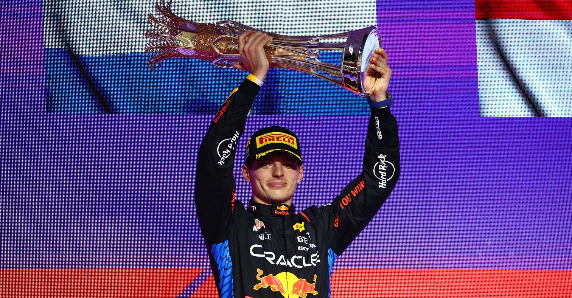 JEDDAH, SAUDI ARABIA - MARCH 09: Race winner Max Verstappen of the Netherlands and Oracle Red Bull Racing celebrates on the podium during the F1 Grand Prix of Saudi Arabia at Jeddah Corniche Circuit on March 09, 2024 in Jeddah, Saudi Arabia. (Photo by Clive Rose/Getty Images) // Getty Images / Red Bull Content Pool // SI202403090506 // Usage for editorial use only //