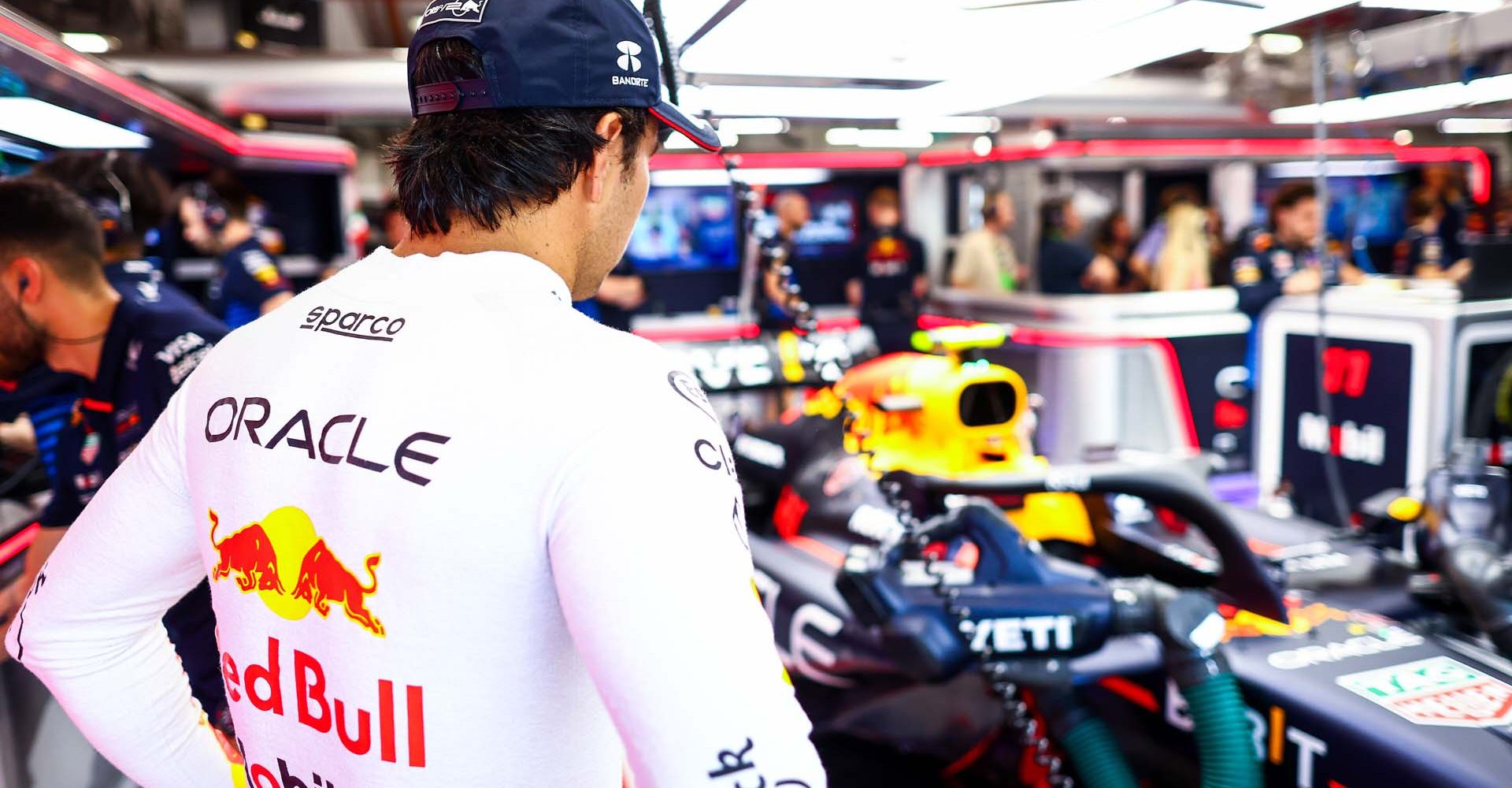 SINGAPORE, SINGAPORE - SEPTEMBER 20: Sergio Perez of Mexico and Oracle Red Bull Racing prepares to drive in the garage during practice ahead of the F1 Grand Prix of Singapore at Marina Bay Street Circuit on September 20, 2024 in Singapore, Singapore. (Photo by Mark Thompson/Getty Images) // Getty Images / Red Bull Content Pool // SI202409200117 // Usage for editorial use only //