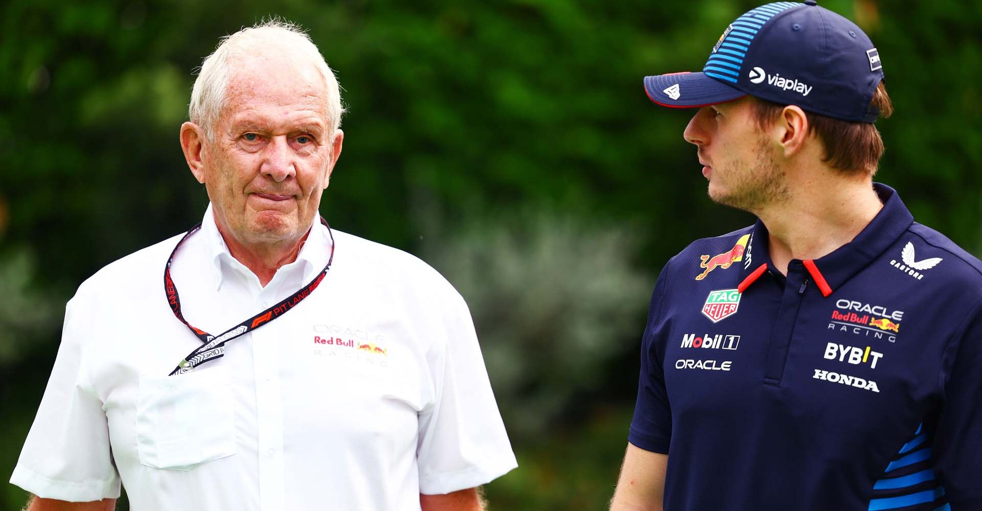 SINGAPORE, SINGAPORE - SEPTEMBER 21: Oracle Red Bull Racing Team Consultant Dr Helmut Marko and Max Verstappen of the Netherlands and Oracle Red Bull Racing talk in the Paddock prior to final practice ahead of the F1 Grand Prix of Singapore at Marina Bay Street Circuit on September 21, 2024 in Singapore, Singapore. (Photo by Mark Thompson/Getty Images) // Getty Images / Red Bull Content Pool // SI202409210279 // Usage for editorial use only //