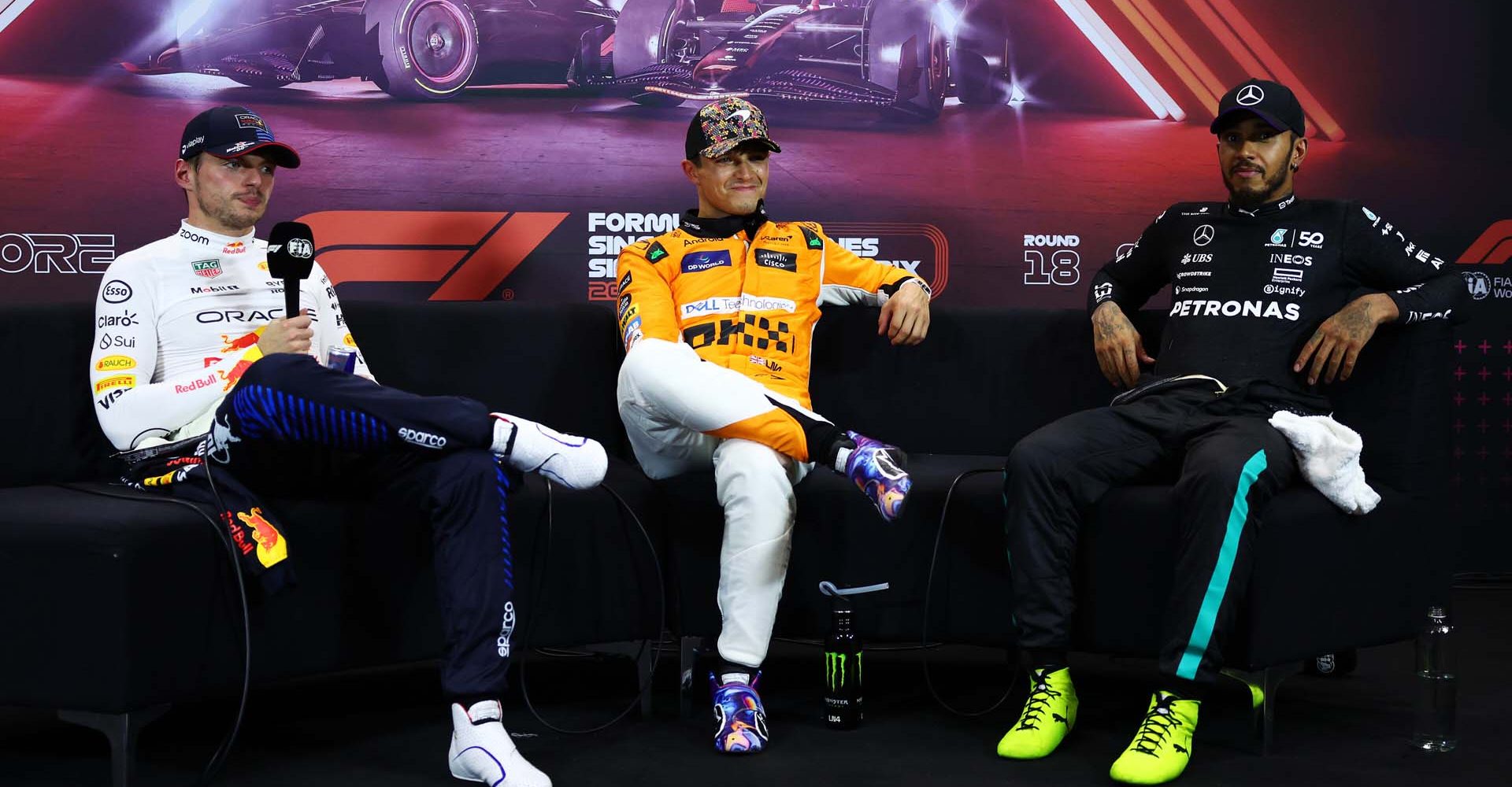 SINGAPORE, SINGAPORE - SEPTEMBER 21: Pole position qualifier Lando Norris of Great Britain and McLaren, Second placed qualifier Max Verstappen of the Netherlands and Oracle Red Bull Racing and Third placed qualifier Lewis Hamilton of Great Britain and Mercedes attend the press conference after qualifying ahead of the F1 Grand Prix of Singapore at Marina Bay Street Circuit on September 21, 2024 in Singapore, Singapore. (Photo by Clive Rose/Getty Images) // Getty Images / Red Bull Content Pool // SI202409210456 // Usage for editorial use only //