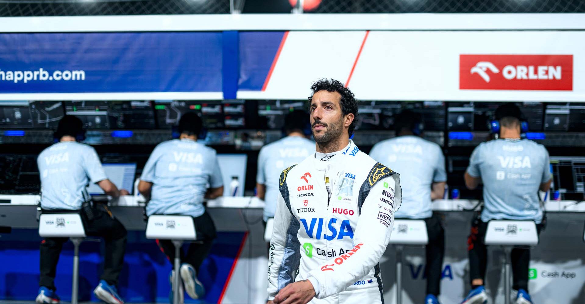 SINGAPORE, SINGAPORE - SEPTEMBER 21: Daniel Ricciardo of Australia and Visa Cash App RB walks to the garage during qualifying ahead of the F1 Grand Prix of Singapore at Marina Bay Street Circuit on September 21, 2024 in Singapore, Singapore. (Photo by Rudy Carezzevoli/Getty Images) // Getty Images / Red Bull Content Pool // SI202409210494 // Usage for editorial use only //