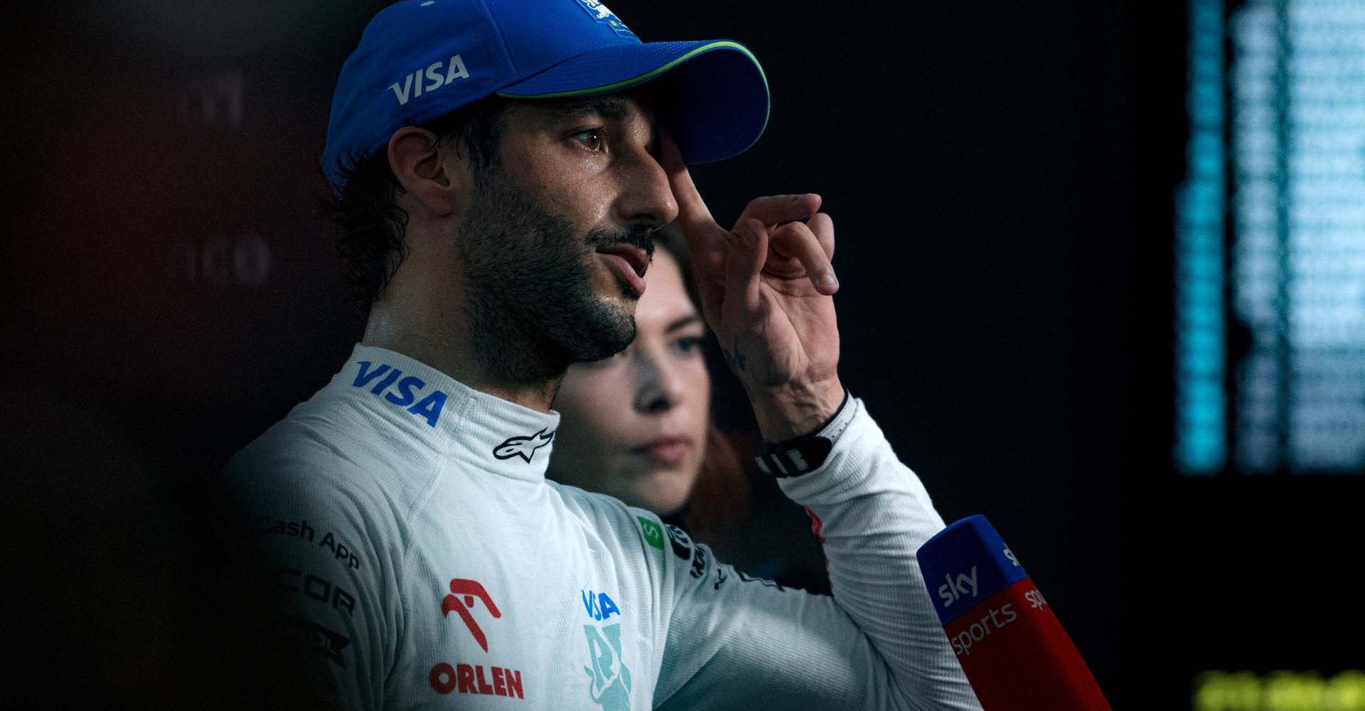 SINGAPORE, SINGAPORE - SEPTEMBER 21: 16th placed qualifier Daniel Ricciardo of Australia and Visa Cash App RB talks to the media in the Paddock during qualifying ahead of the F1 Grand Prix of Singapore at Marina Bay Street Circuit on September 21, 2024 in Singapore, Singapore. (Photo by Rudy Carezzevoli/Getty Images) // Getty Images / Red Bull Content Pool // SI202409210509 // Usage for editorial use only //