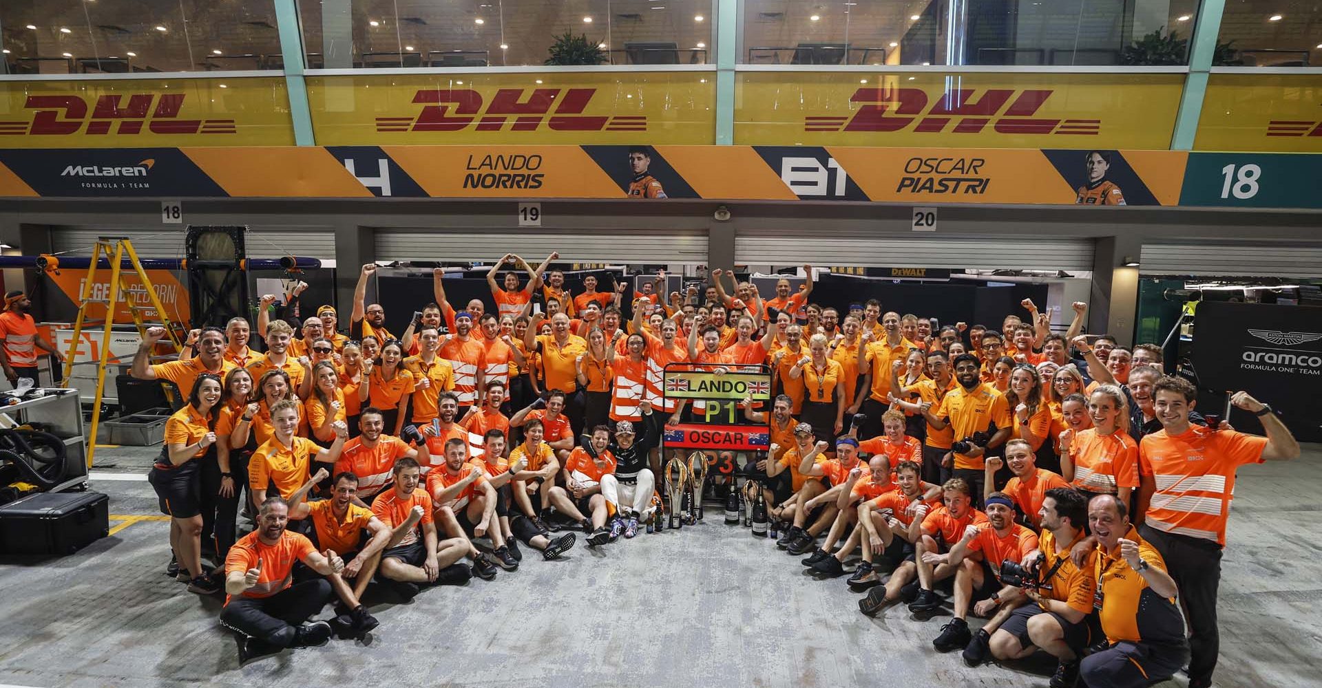 Lando Norris, McLaren F1 Team, 1st position, Oscar Piastri, McLaren F1 Team, 3rd position, Andrea Stella, Team Principal, McLaren F1 Team, and the McLaren team celebrate after the race