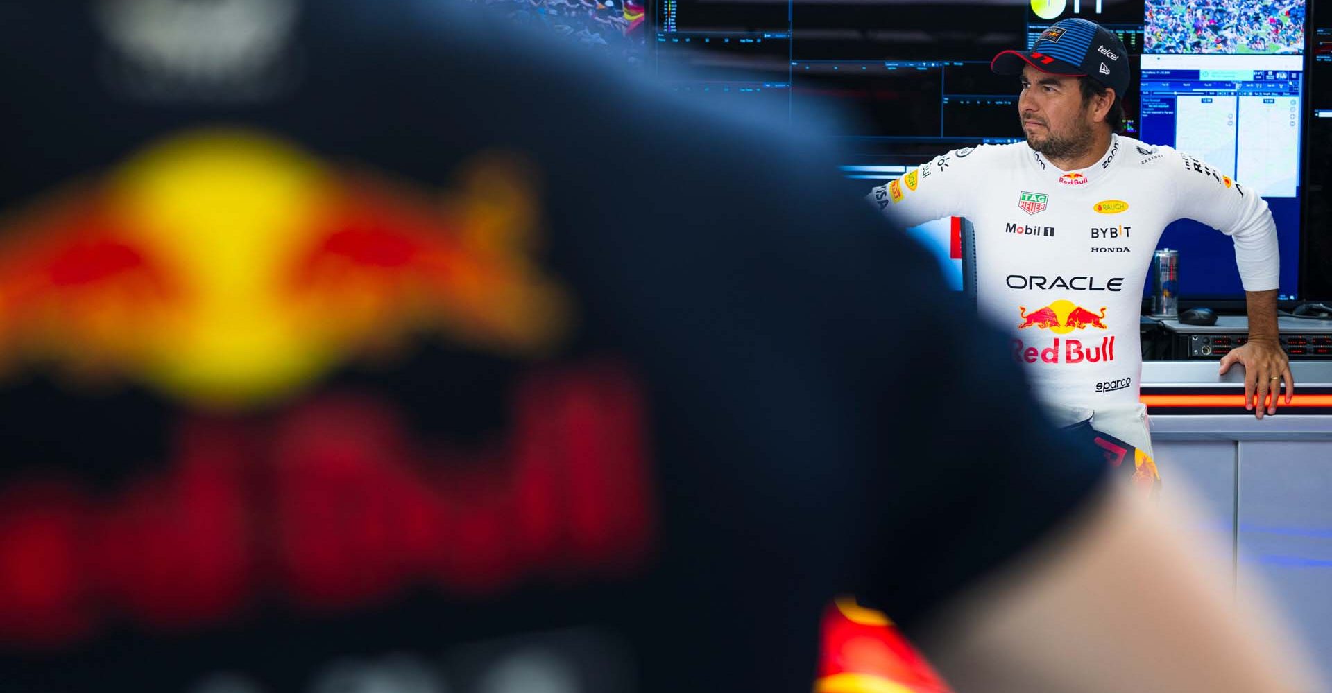 BARCELONA, SPAIN - JUNE 21: Sergio Perez of Mexico and Oracle Red Bull Racing looks on in the garage during practice ahead of the F1 Grand Prix of Spain at Circuit de Barcelona-Catalunya on June 21, 2024 in Barcelona, Spain. (Photo by Rudy Carezzevoli/Getty Images) // Getty Images / Red Bull Content Pool // SI202406210634 // Usage for editorial use only //