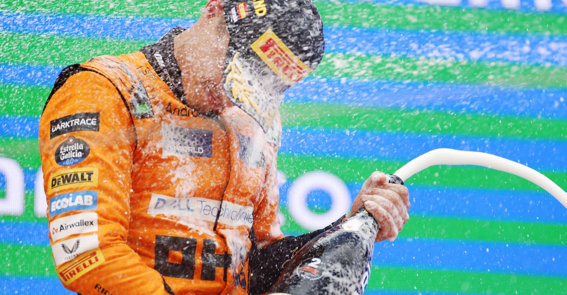 Lando Norris, McLaren F1 Team, 2nd position, sprays Champagne on the podium