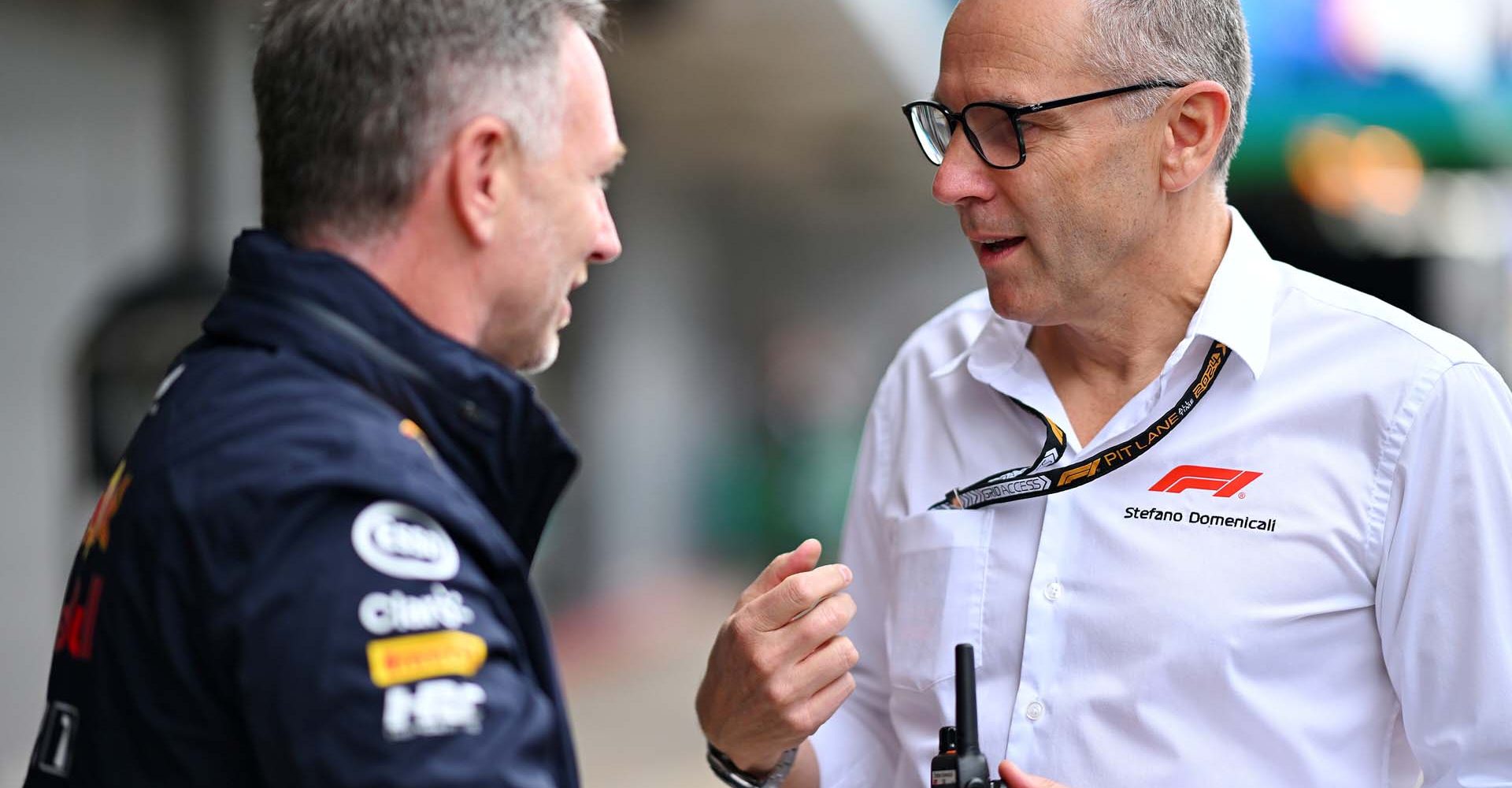 BARCELONA, SPAIN - JUNE 23: Oracle Red Bull Racing Team Principal Christian Horner and Stefano Domenicali, CEO of the Formula One Group, talk in the Paddock prior to the F1 Grand Prix of Spain at Circuit de Barcelona-Catalunya on June 23, 2024 in Barcelona, Spain. (Photo by Rudy Carezzevoli/Getty Images) // Getty Images / Red Bull Content Pool // SI202406230066 // Usage for editorial use only //