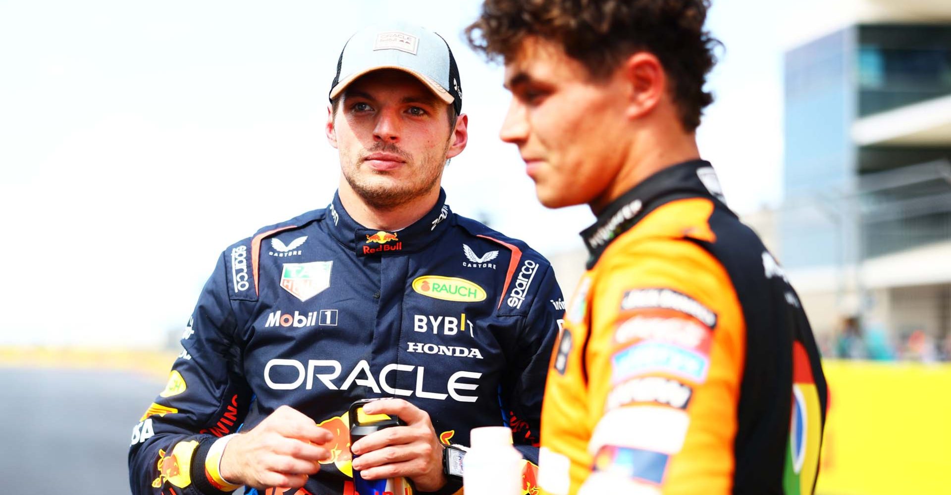 AUSTIN, TEXAS - OCTOBER 19: Sprint winner Max Verstappen of the Netherlands and Oracle Red Bull Racing and Third placed Lando Norris of Great Britain and McLaren talk in parc ferme during the Sprint ahead of the F1 Grand Prix of United States at Circuit of The Americas on October 19, 2024 in Austin, Texas. (Photo by Mark Thompson/Getty Images) // Getty Images / Red Bull Content Pool // SI202410190749 // Usage for editorial use only //