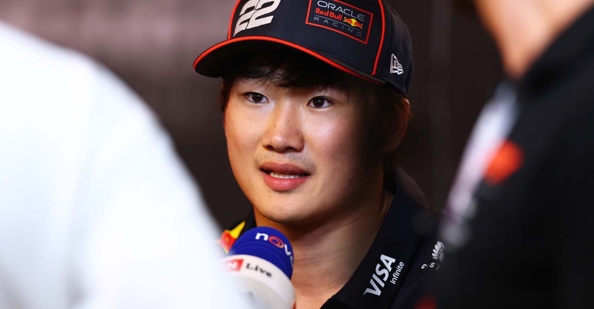 ABU DHABI, UNITED ARAB EMIRATES - DECEMBER 06: Tenth placed qualifier Yuki Tsunoda of Japan and Oracle Red Bull Racing is interviewed  during qualifying ahead of the F1 Grand Prix of Abu Dhabi at Yas Marina Circuit on December 06, 2025 in Abu Dhabi, United Arab Emirates. (Photo by Zak Mauger/LAT Images) // Getty Images / Red Bull Content Pool // SI202512060542 // Usage for editorial use only //