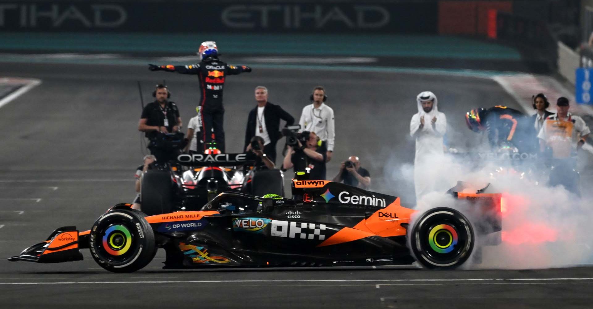 ABU DHABI, UNITED ARAB EMIRATES - DECEMBER 07: 2025 F1 World Drivers Champion and Third placed Lando Norris of Great Britain driving the (4) McLaren MCL39 Mercedes performs donuts on track during the F1 Grand Prix of Abu Dhabi at Yas Marina Circuit on December 07, 2025 in Abu Dhabi, United Arab Emirates. (Photo by Michael Potts/LAT Images)