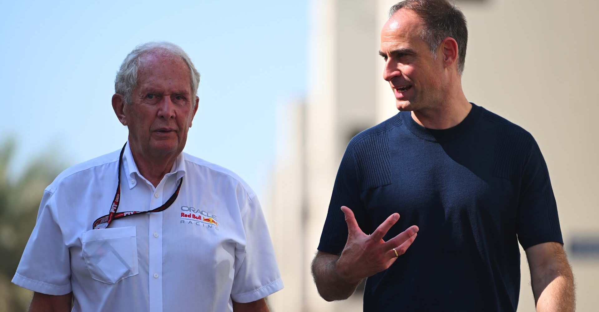 ABU DHABI, UNITED ARAB EMIRATES - DECEMBER 07: Dr Helmut Marko, Team Consultant of Oracle Red Bull Racing and Oliver Mintzlaff, Managing director of Red Bull GmbH, talk as they walk in the Paddock prior to the F1 Grand Prix of Abu Dhabi at Yas Marina Circuit on December 07, 2025 in Abu Dhabi, United Arab Emirates. (Photo by Rudy Carezzevoli/Getty Images) // Getty Images / Red Bull Content Pool // SI202512070047 // Usage for editorial use only //